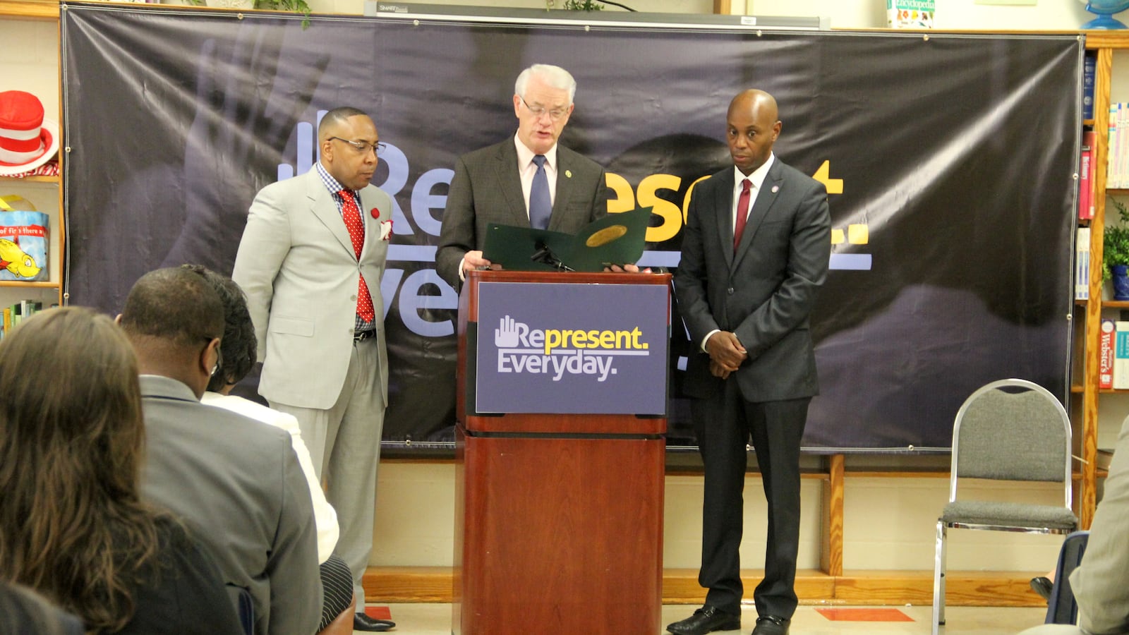 From left: Cherokee Elementary School principal Rodney Rowan, Shelby County Mayor Mark Luttrell and Superintendent Dorsey Hopson speak Wednesday at a press conference in Memphis about initiatives designed to increase student attendance in Shelby County Schools.
