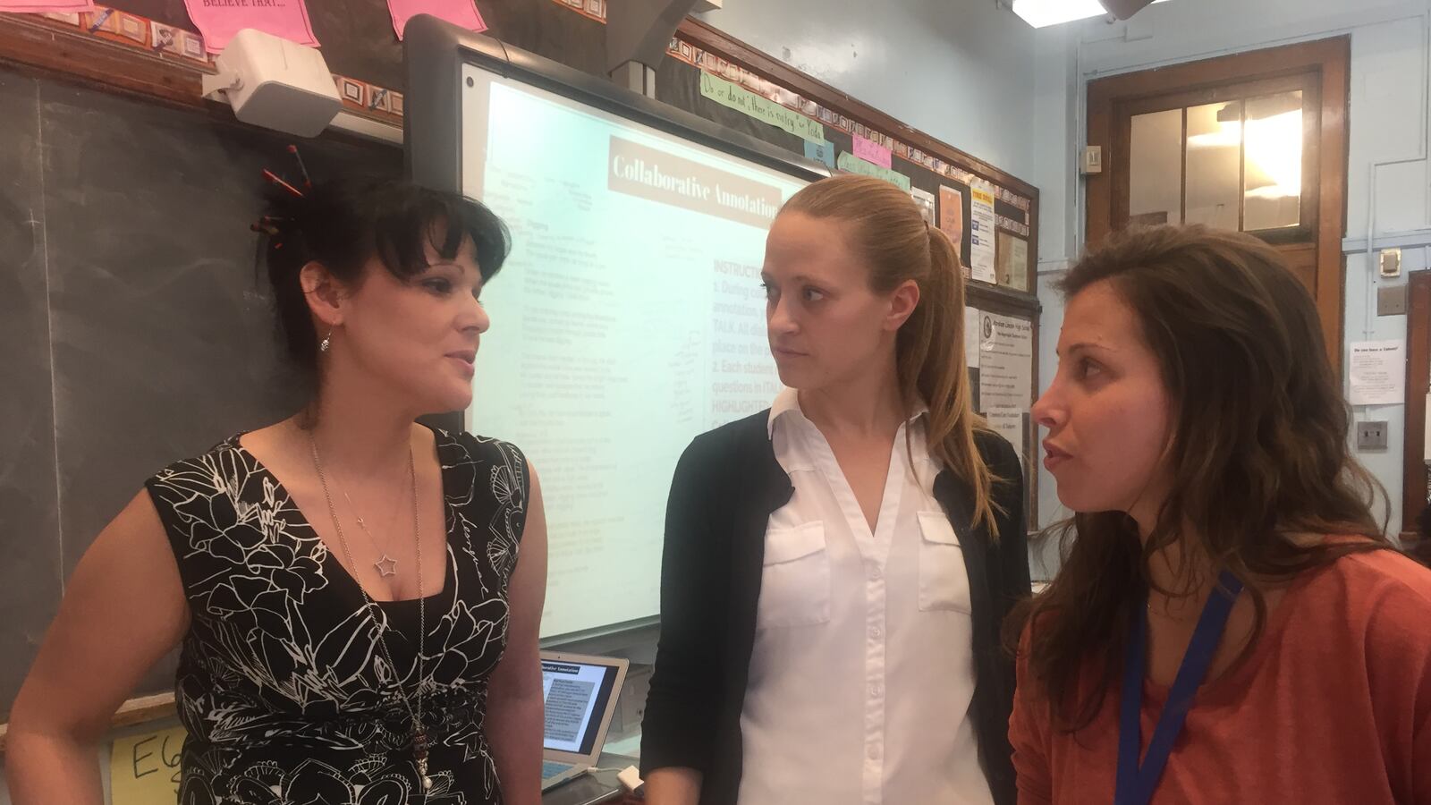 Sofia de Bari hears advice from Christine LaRubio, a veteran teacher, as part of a professional development program for first-year teachers at Abraham Lincoln.
