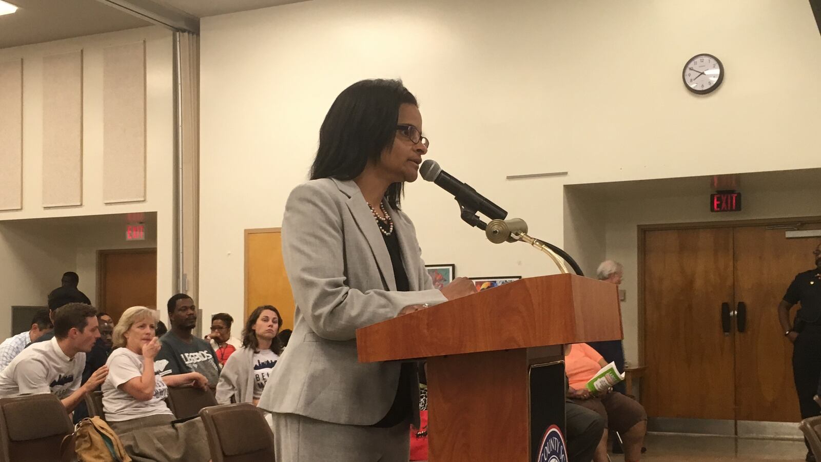 Daphnè Robinson, director of charter schools for Shelby County Schools, offers recommendations to the school board.