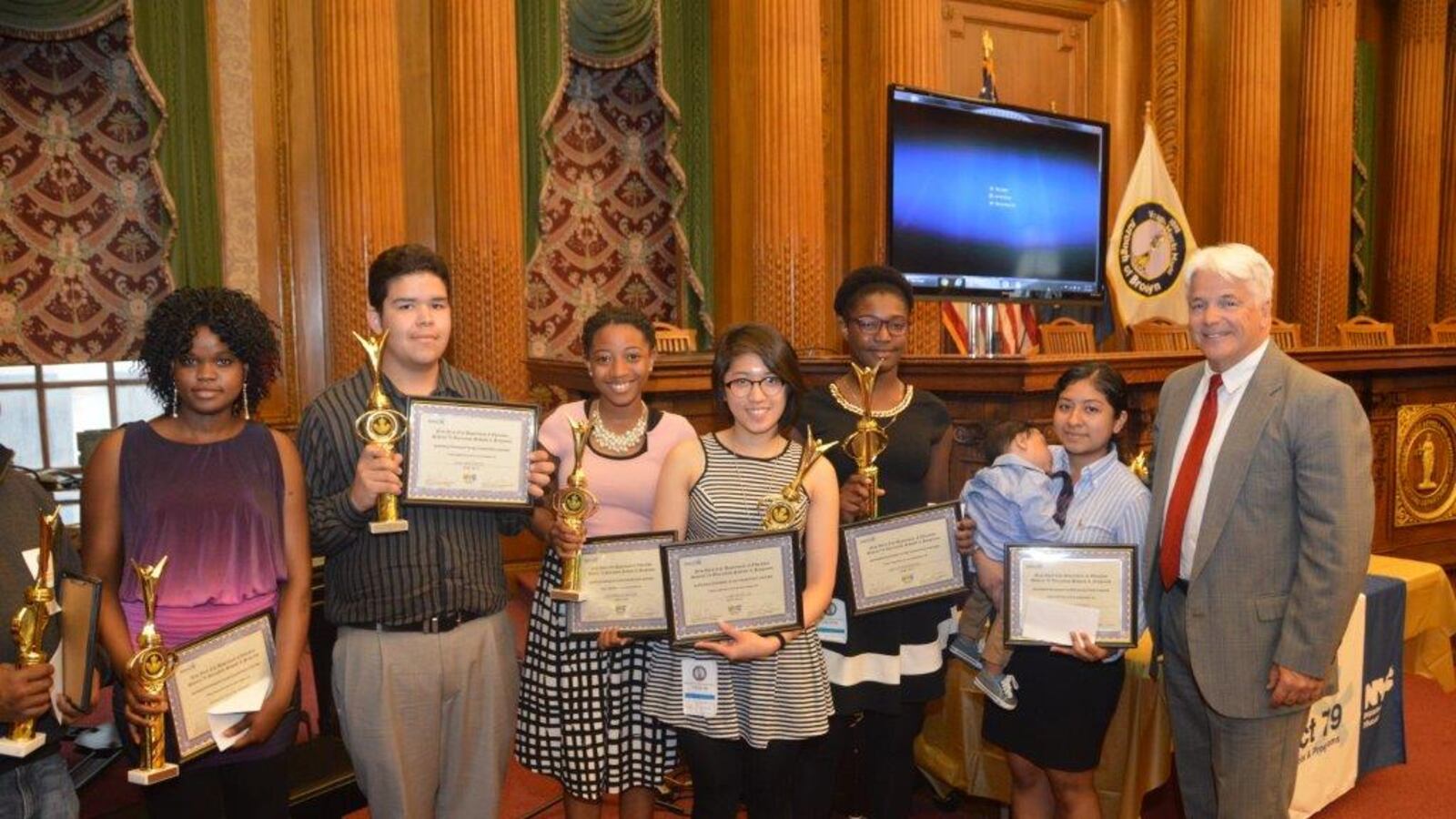Tim Lisante with students. (Photo provided by the Department of Education)