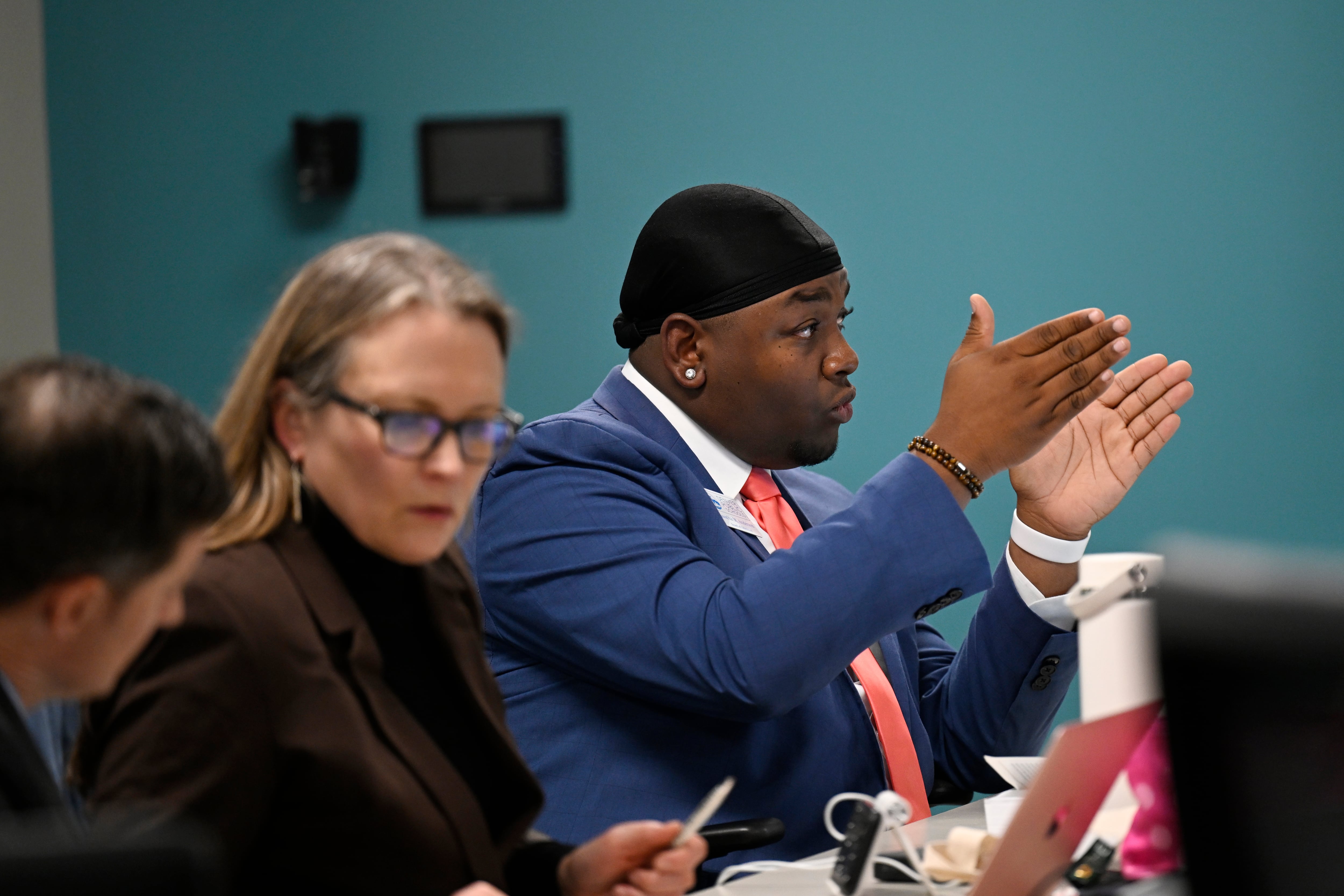 Denver Board of Education member Auon’tai Anderson speaks passionately during a board meeting.