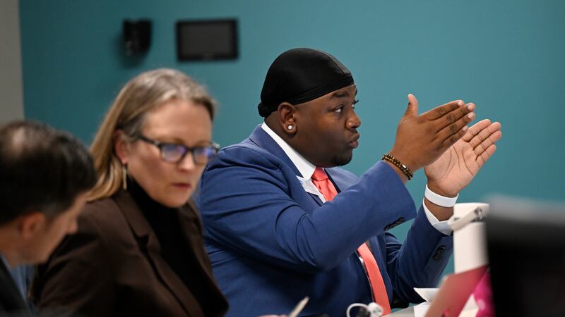 Denver Board of Education member Auon’tai Anderson speaks passionately during a board meeting.