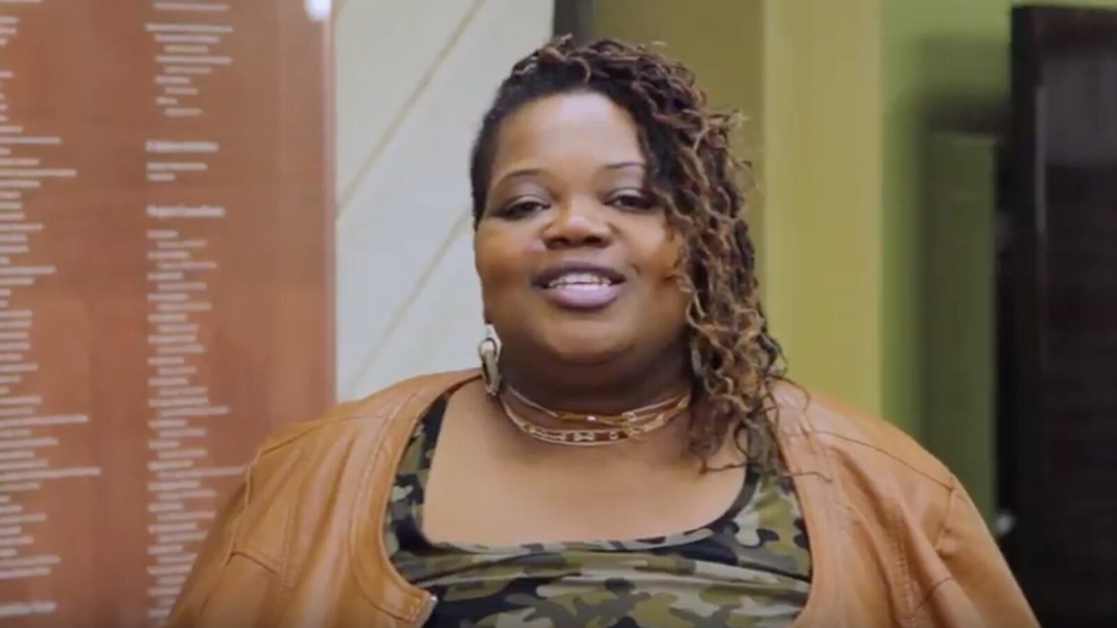 Parent advocate Bernita Bradley shares a story about a great teacher who helped he brother in a Detroit schools story booth.