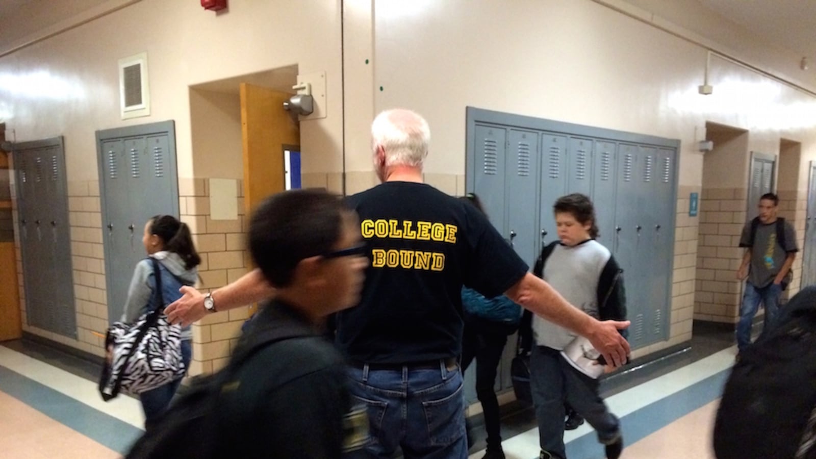 Students at Kepner Middle School in southwest Denver pass between classes. Plans to open a new STRIVE charter school and district-run program in 2015 are on hold for a year.