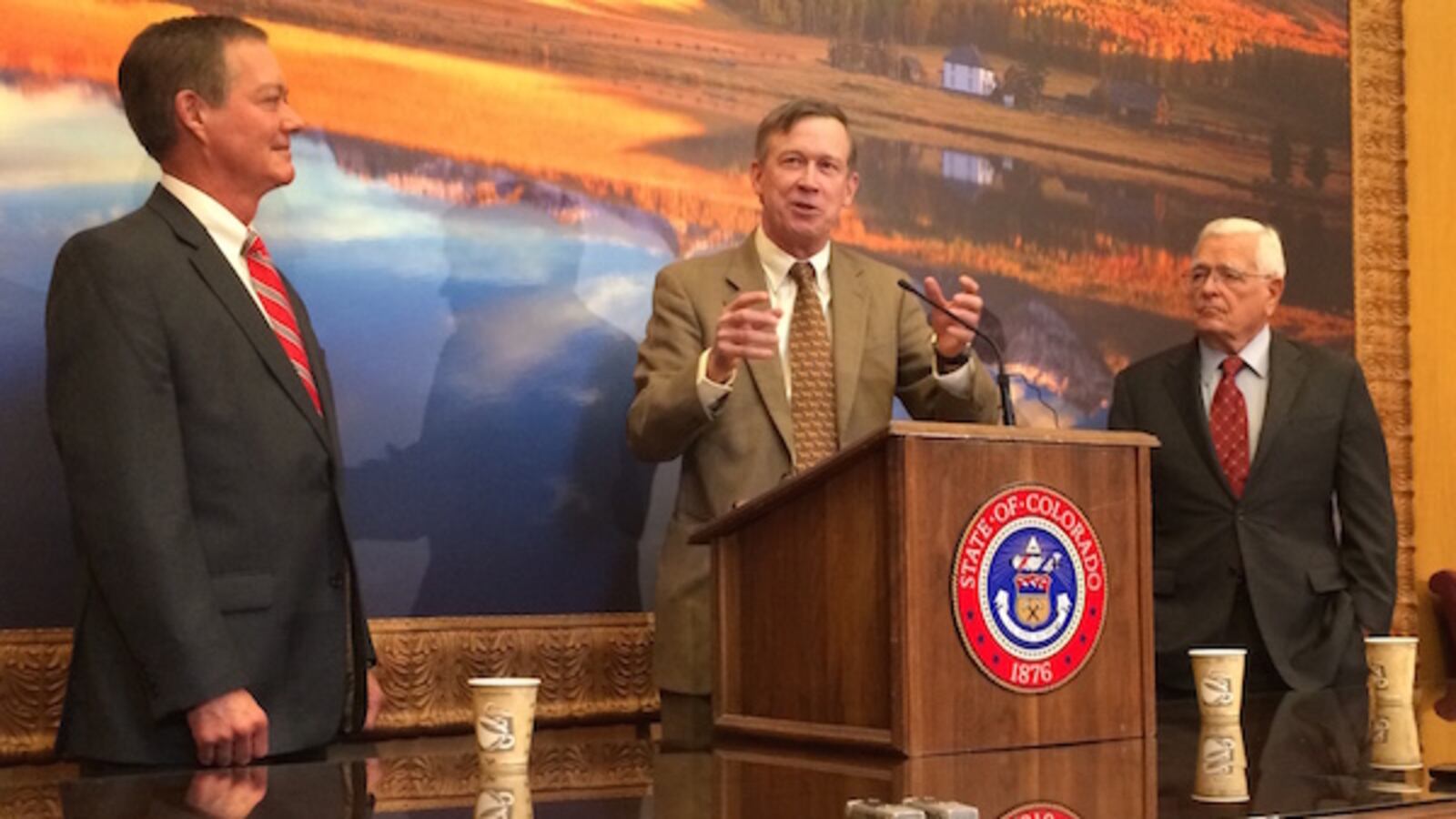 Gov. John Hickenlooper (center) talked standards and testing with former governors Bill Owens (left) and Roy Romer (right).