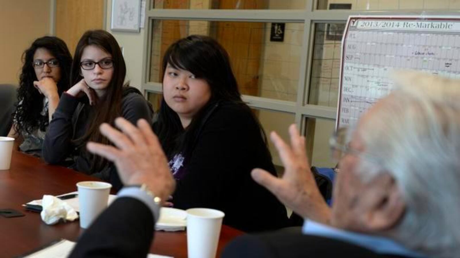 Students at Adams City High  listen to Dave Nikaido, who graduated from the school in 1952, describe how difficult it was for him decades ago to start school in America knowing no English — only Japanese.