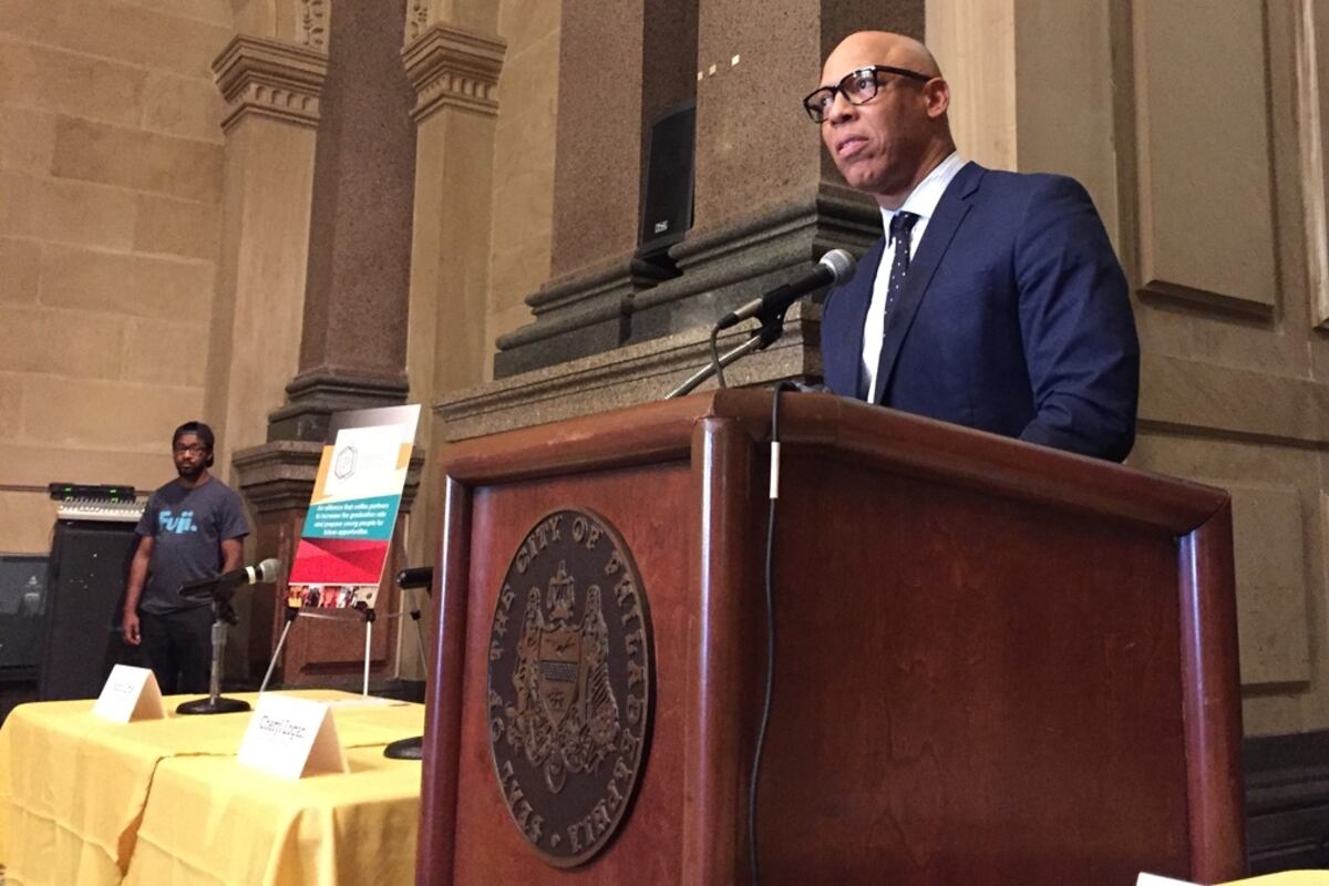 Superintendent William Hite standing at a podium.