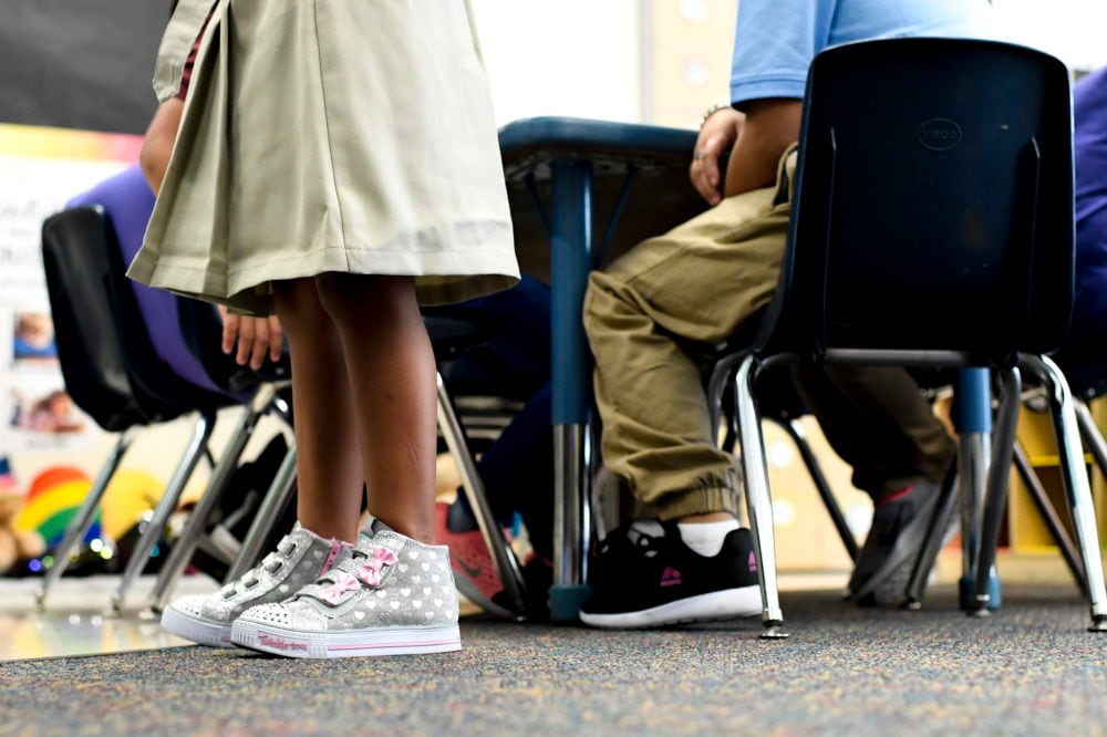 Students in kindergarten on the first day of school at McGlone Academy.