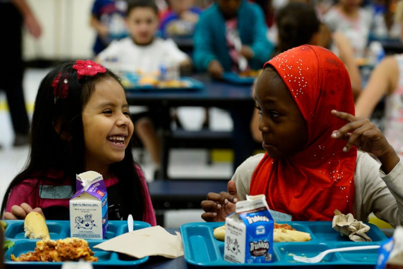 First graders eat their lunch at Laredo Elementary School in Aurora. (Photo by Seth McConnell/The Denver Post)