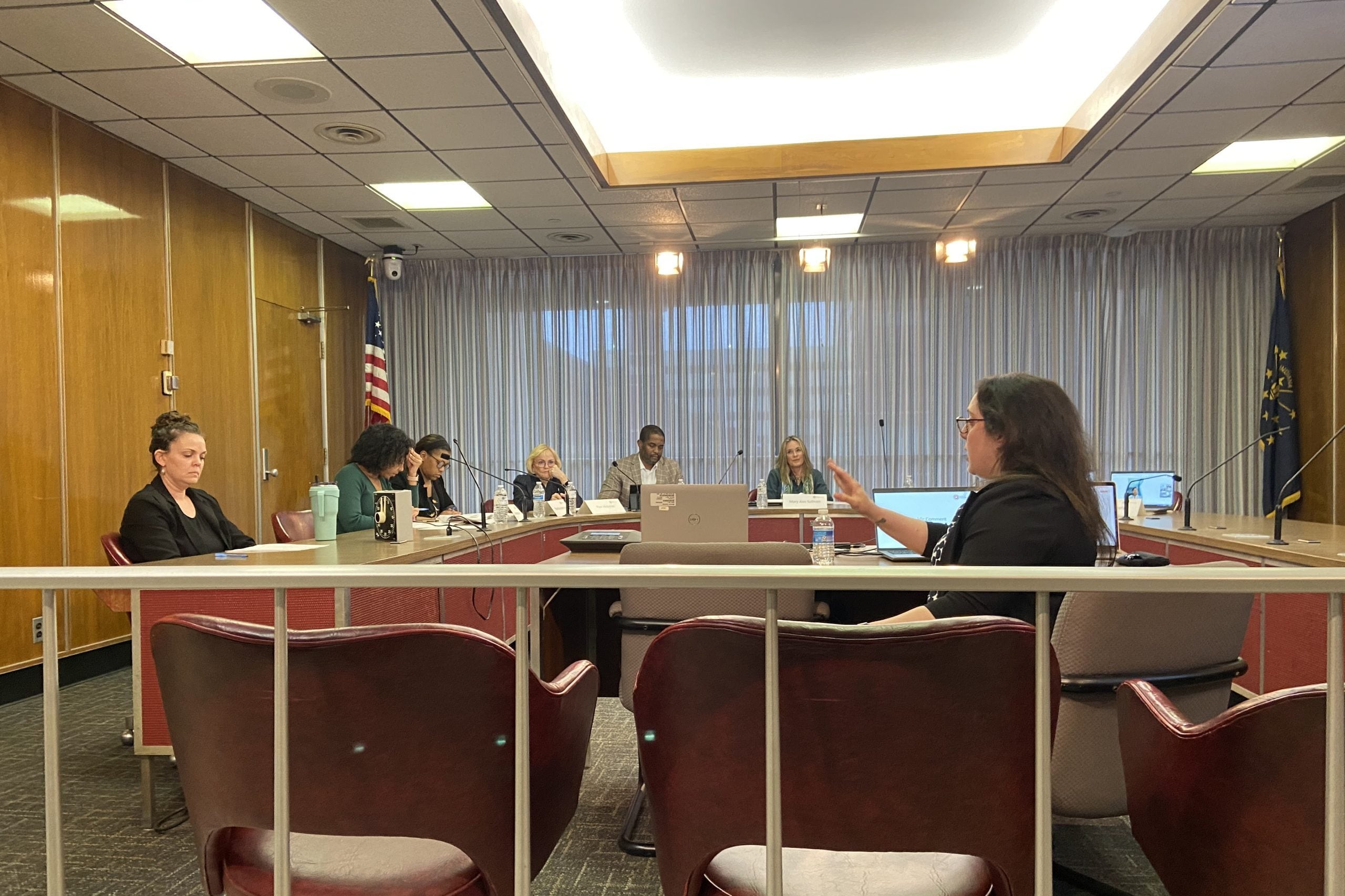 people around a desk