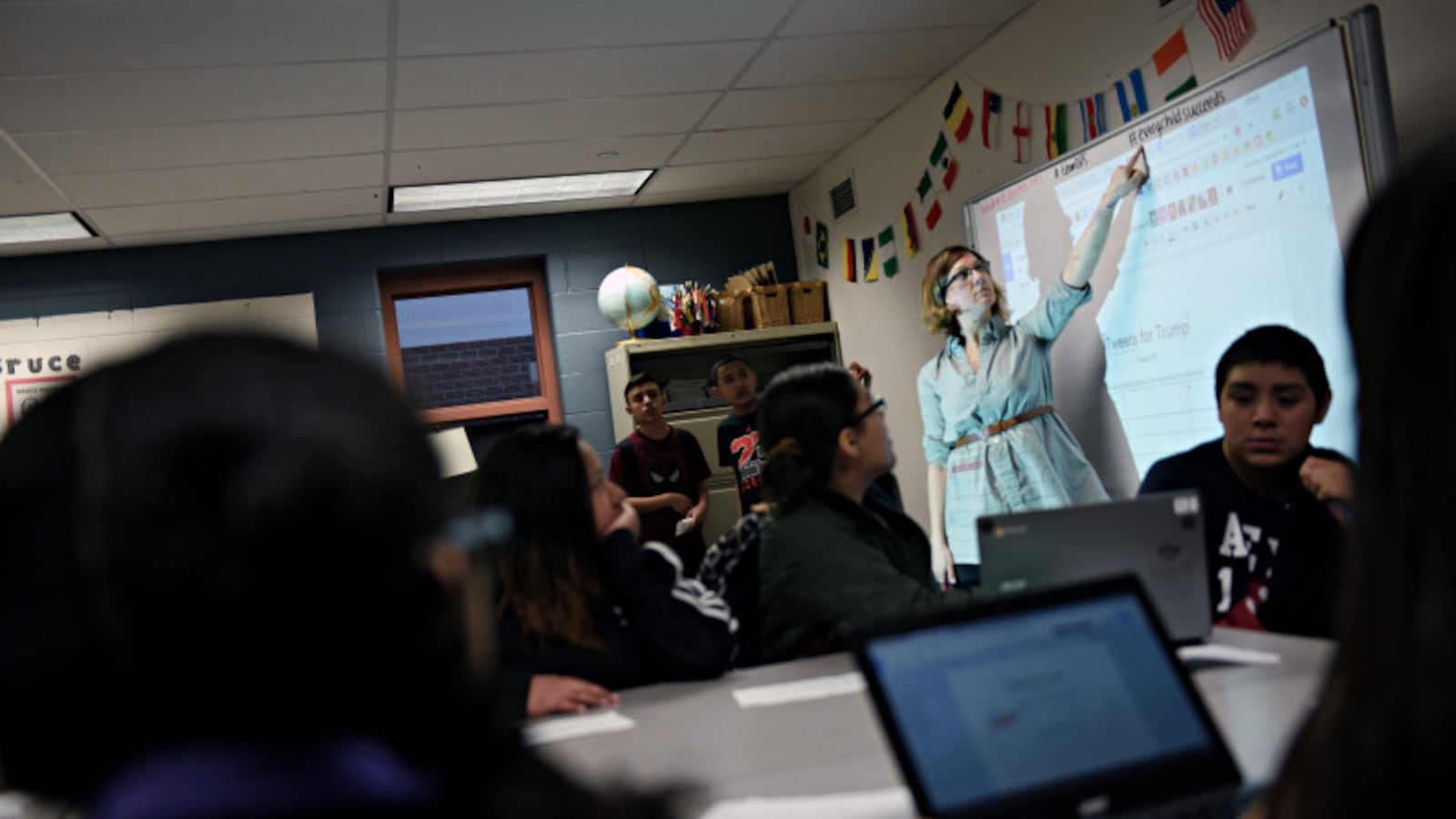 Teacher Mandy Rees talks to her middle school students at Bruce Randolph School on Wednesday, March 1, 2017.