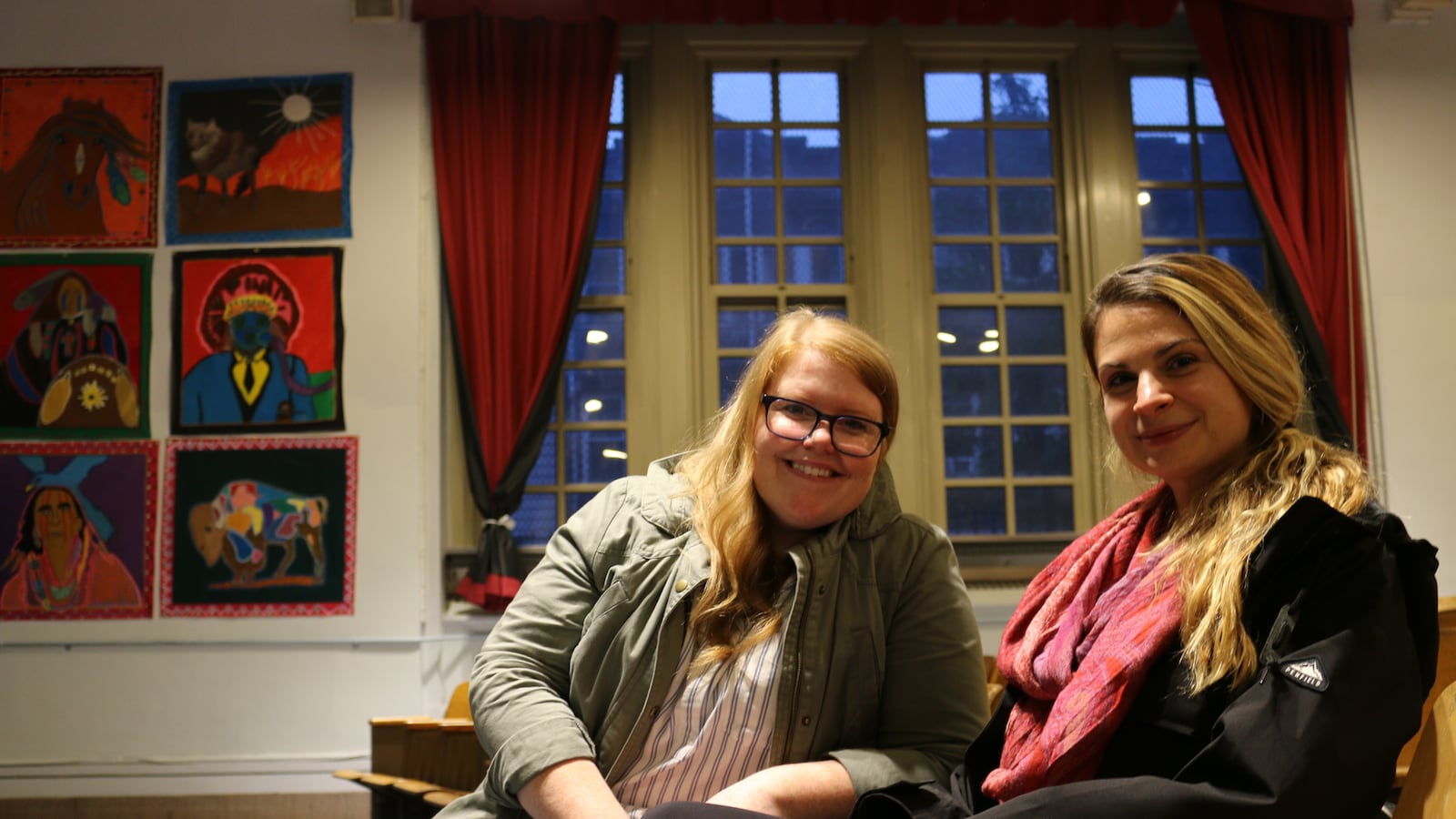 Sunset Park Prep Principal Jennifer Spalding, left, and Assistant Principal Lauren Scott, right, sit in the school auditorium, which was renovated with funds won through participatory budgeting.