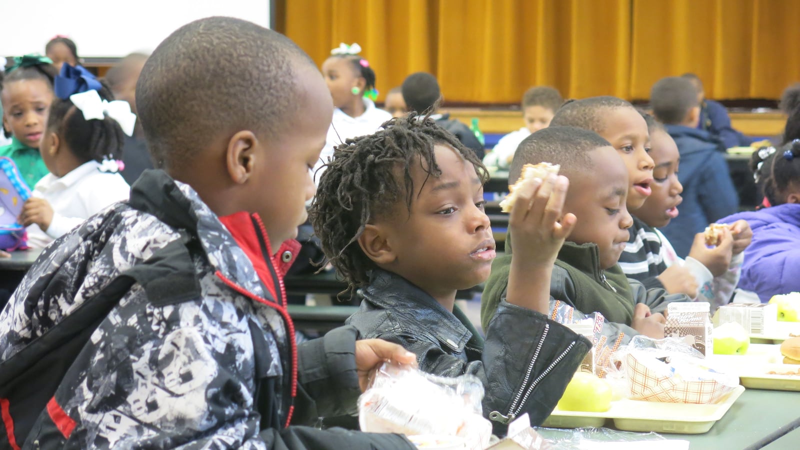 Kids eating lunch at Aspire Hanley Elementary, in Orange Mound.