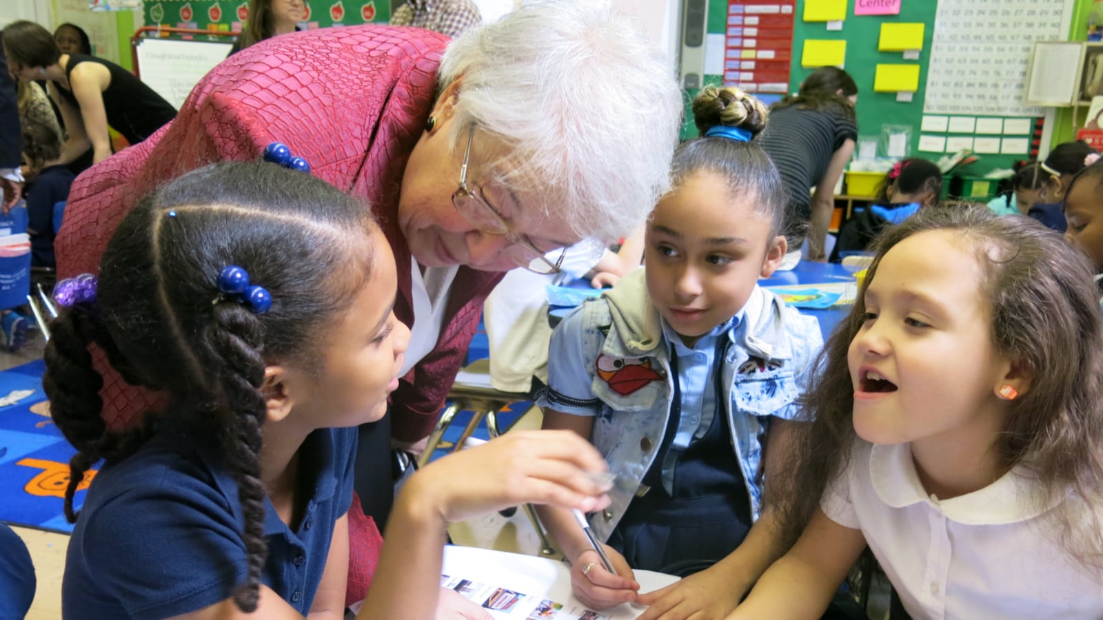 Chancellor Carmen Fariña with students at P.S. 15 in 2014.