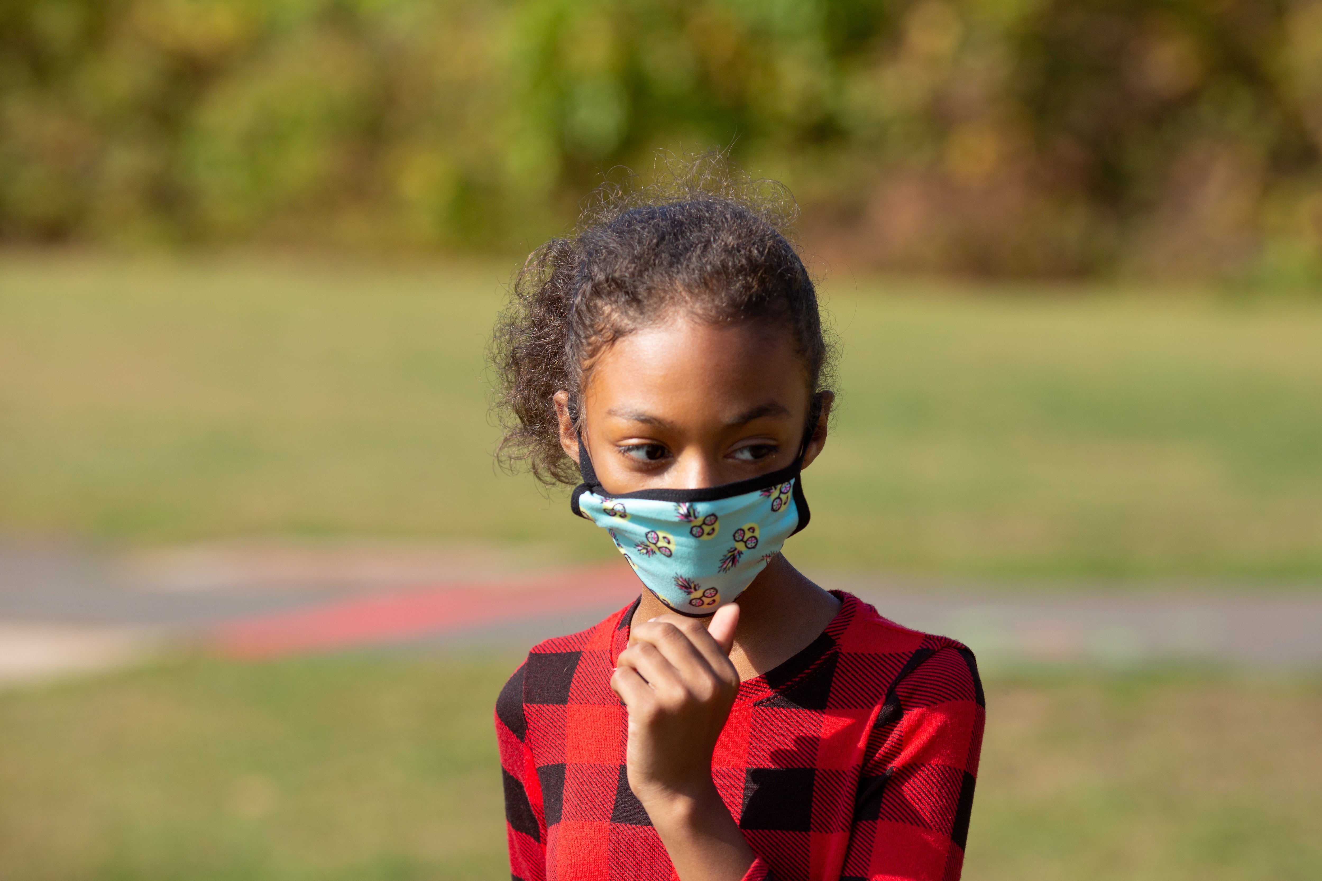 Students in Mr. Wolfram’s fifth grade class take a mask break on the school field at Wesley Elementary School in Middletown, CT, October 5, 2020.