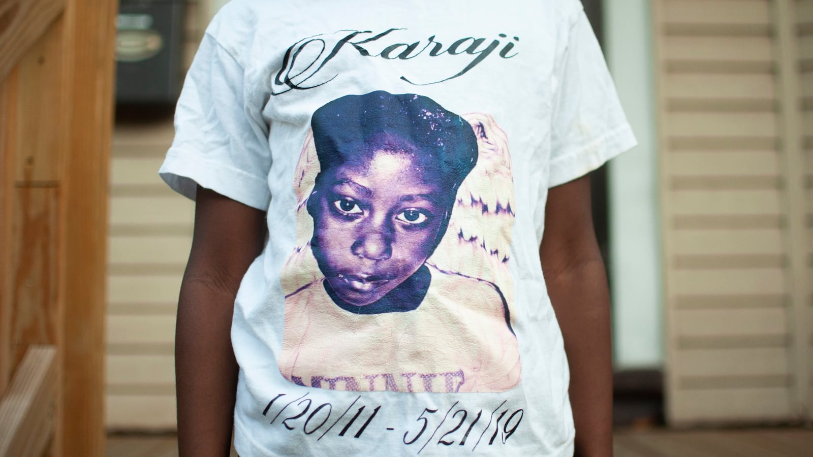 Amayi Jones wears a shirt that memorializes her twin sister, Karaji, who died after a severe asthma attack in May.