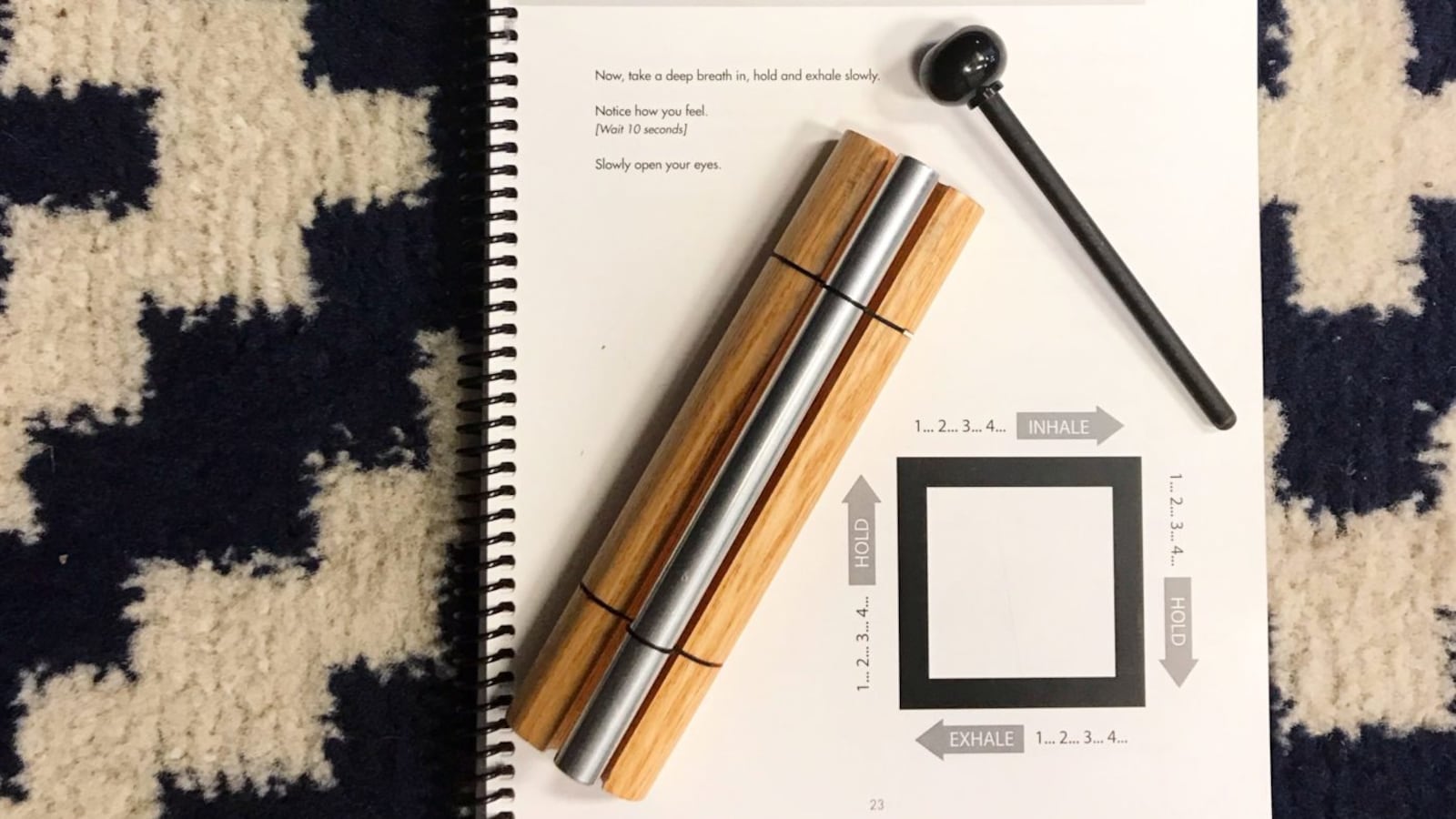 Calm Classroom accessories including wood chimes and a curriculum guide