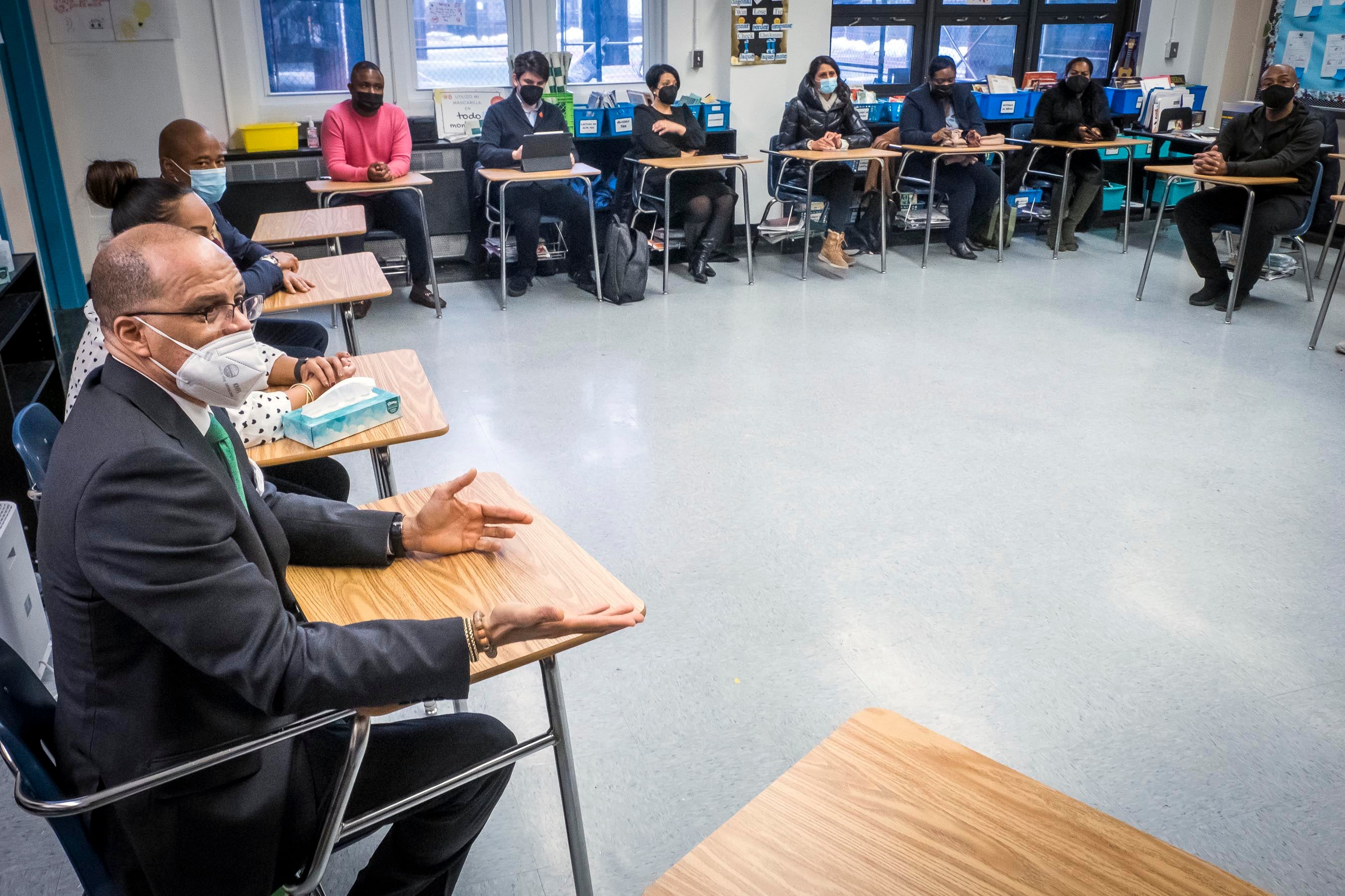 Chancellor David Banks, left, decided against making last-minute changes to the city’s complicated high school admissions process. Above, Banks visits a classroom in the Bronx.