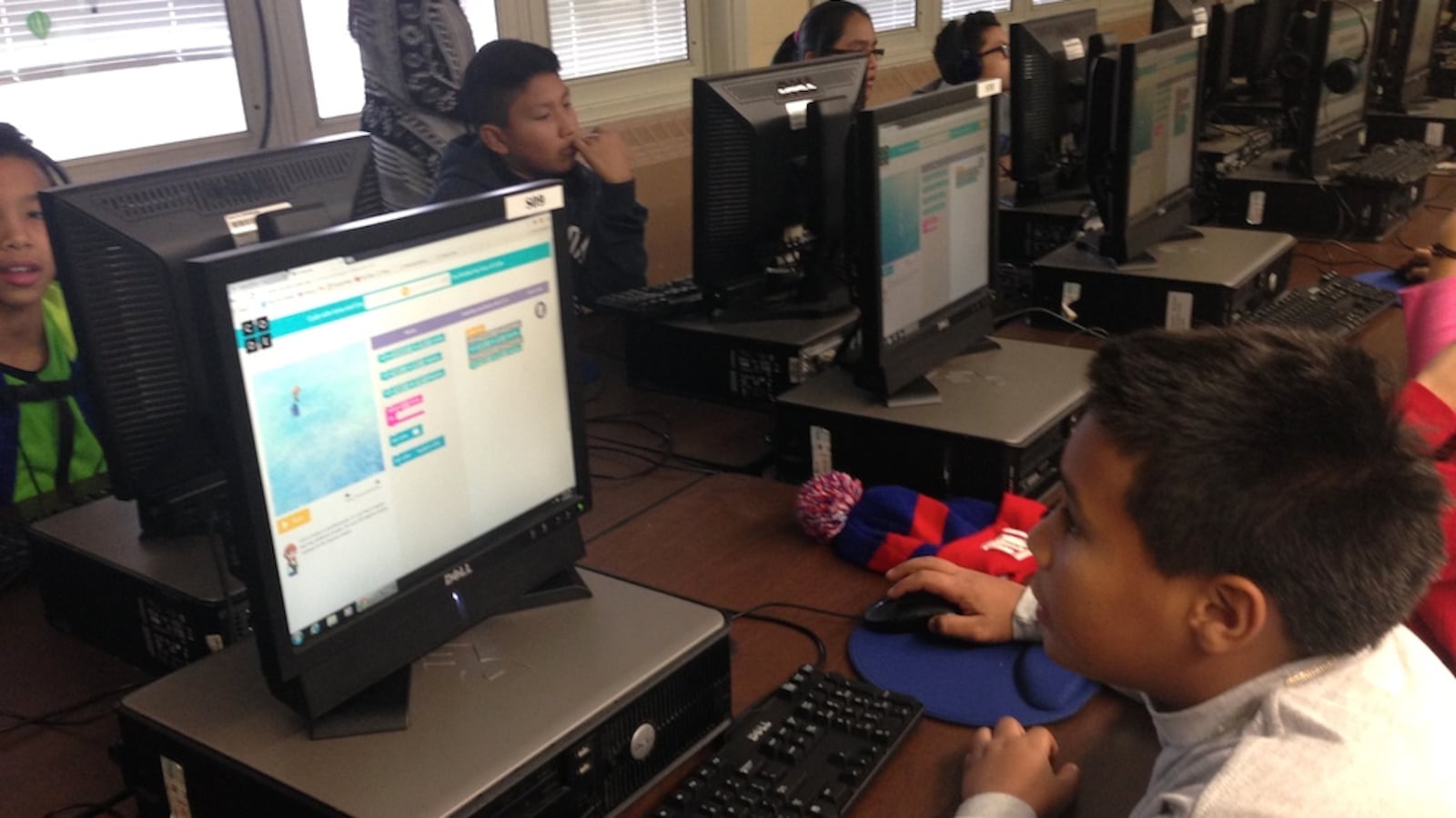 A sixth grade class at M.S. 88 participate in an "Hour of Coding" event organized by the computer science advocacy group Code.org. The city is planning to train 100 teachers on new computer science curriculum by 2017.