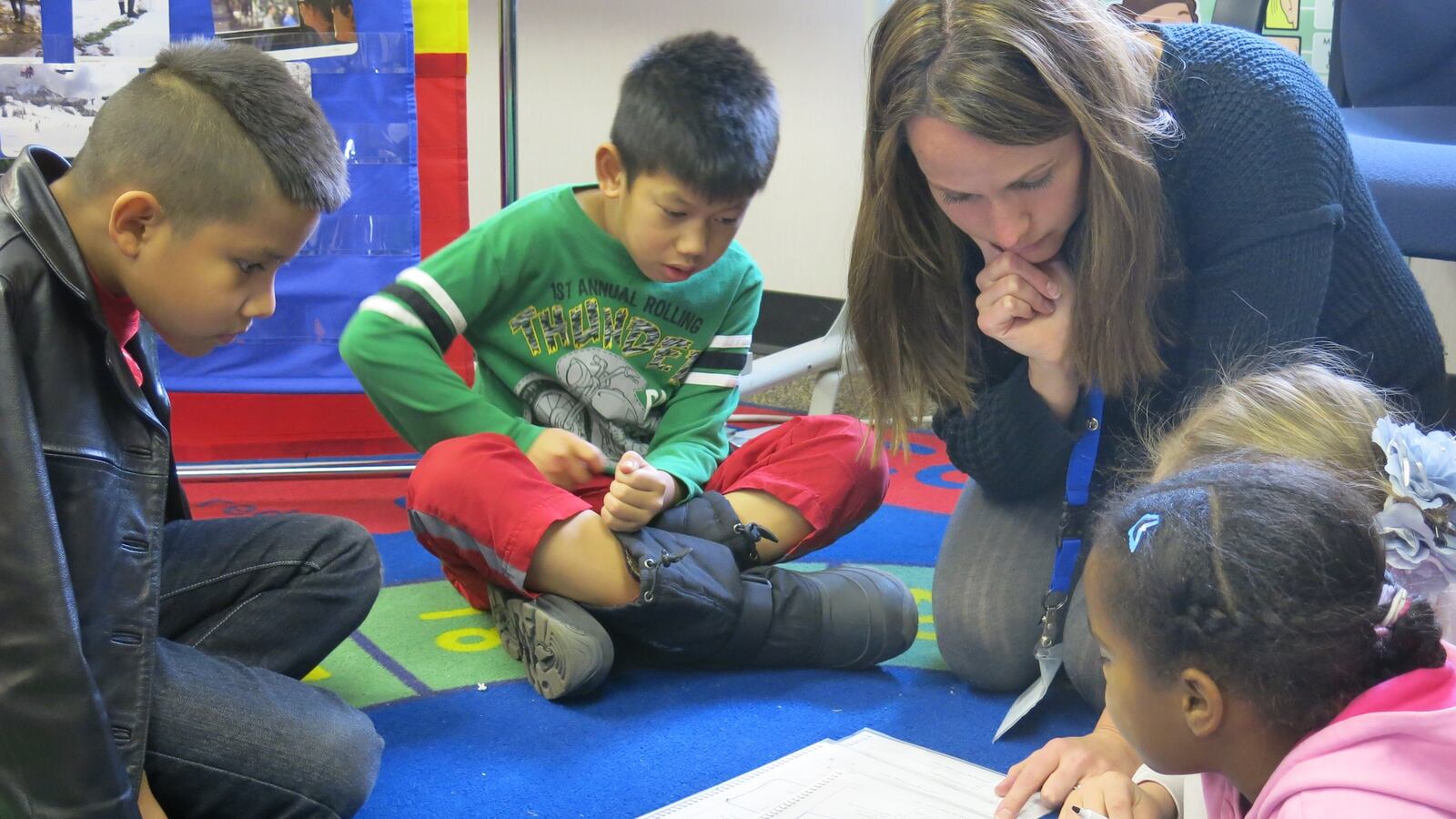Third graders at Ellis Elementary study English with ESL teacher Bree Roon. Each of these children has a different native language.