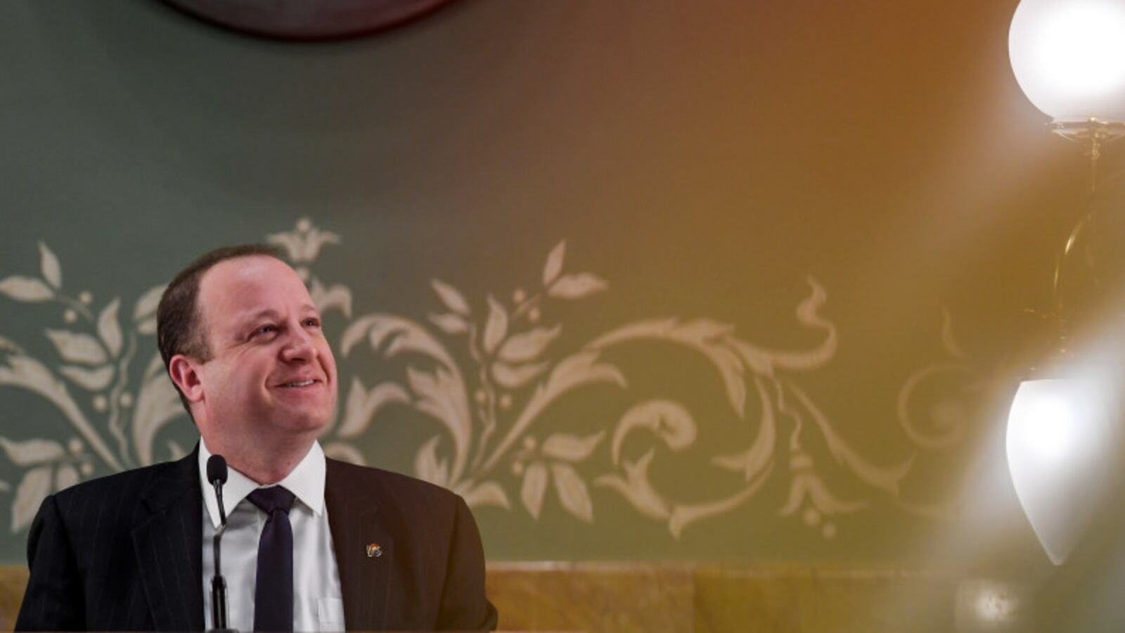 Gov. Jared Polis delivers his State of the State address at the Colorado State Capitol on Jan. 9, 2020.