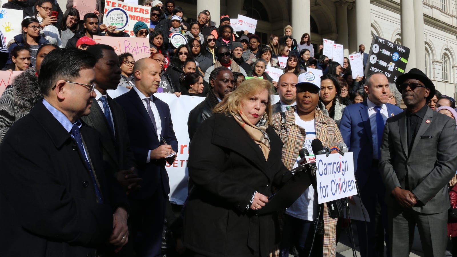 Kim Medina, the head of District Council 1707, spoke at a rally at City Hall to demand that pre-K teachers in community organizations are paid equally to education department teachers on March 20, 2019.