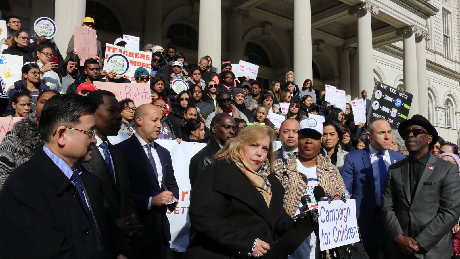 Kim Medina, the head of District Council 1707, spoke at a rally at City Hall to demand that pre-K teachers in community organizations are paid equally to education department teachers on March 20, 2019.