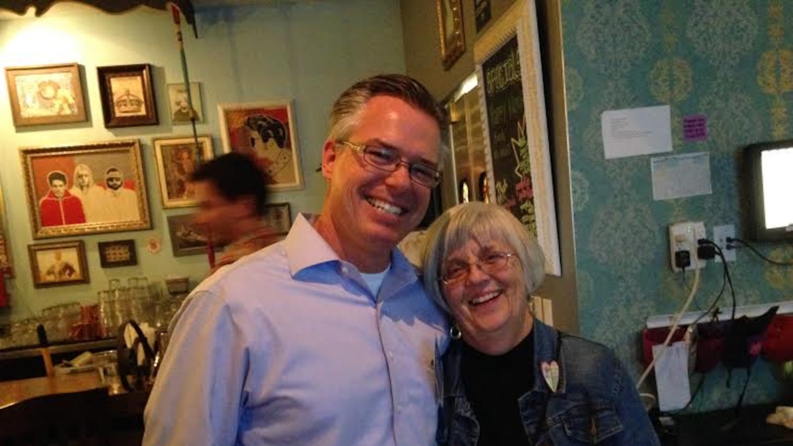 Robert Speth with a supporter at his election watch party at a northwest Denver restaurant (Melanie Asmar).