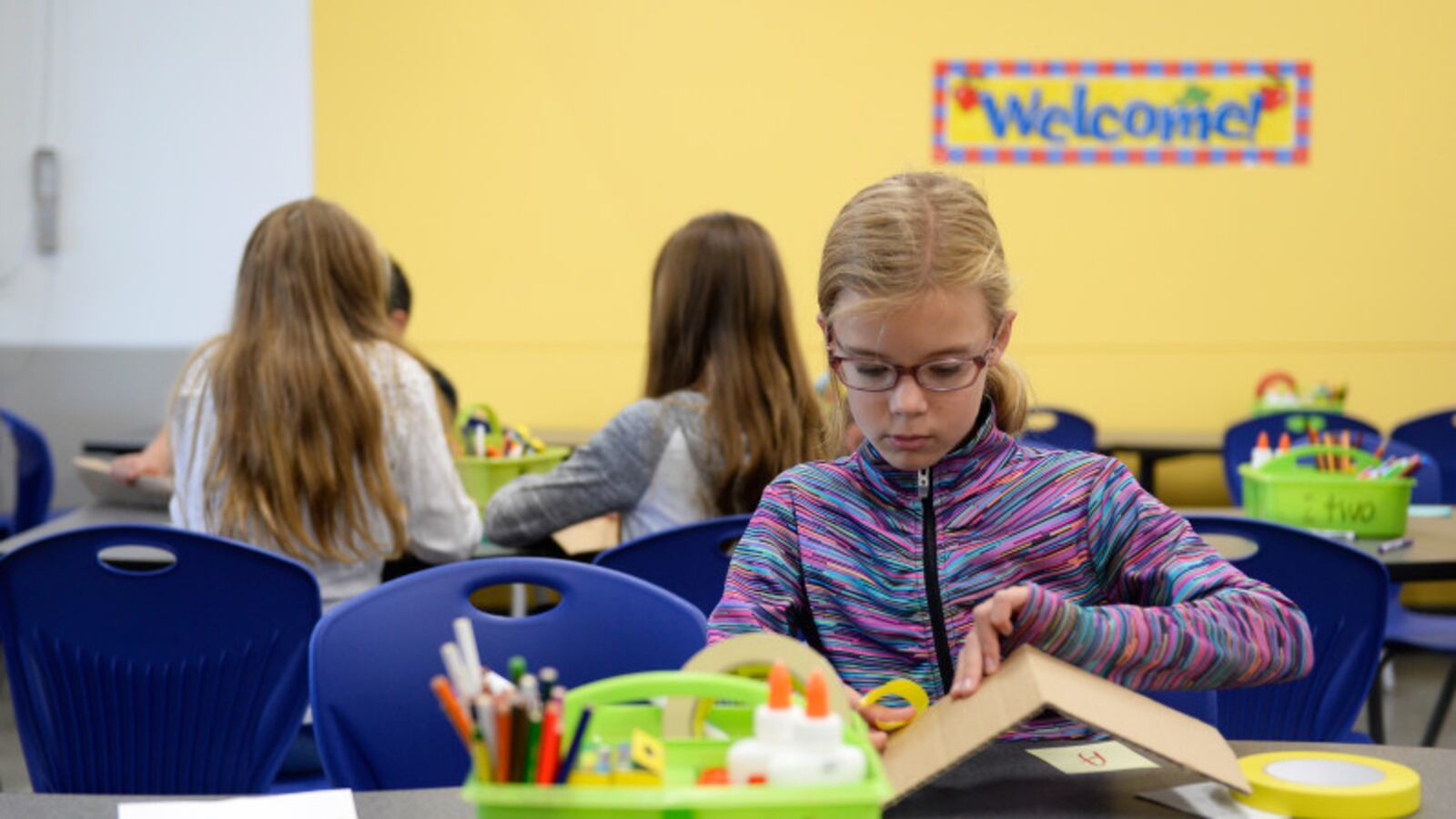 Allison Pippert, 10, constructs a name plate during her fifth-grade class at Stargate School (Photo by Anya Semenoff/The Denver Post)