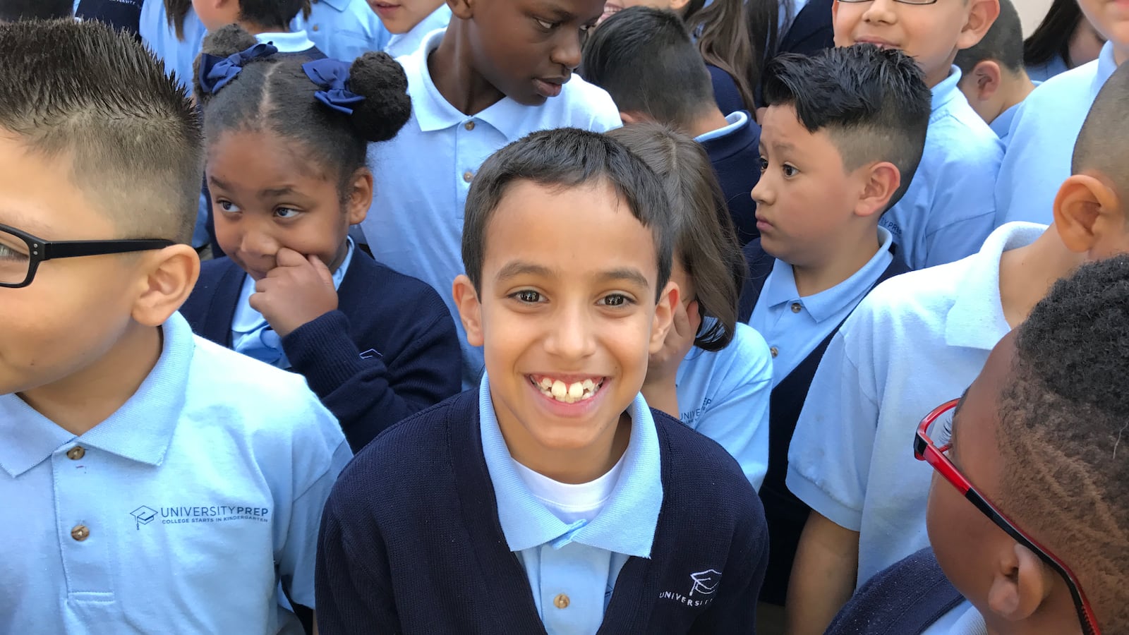 University Prep Steele Street students at a celebration of their test scores Friday.