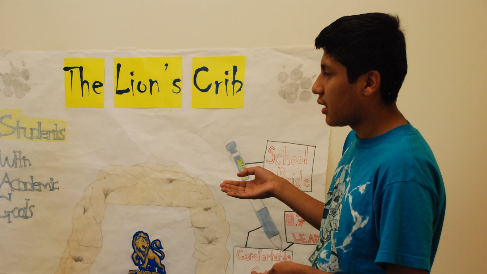 A student at STRIVE Excel rehearses a script for a student store run by the students at the high school.