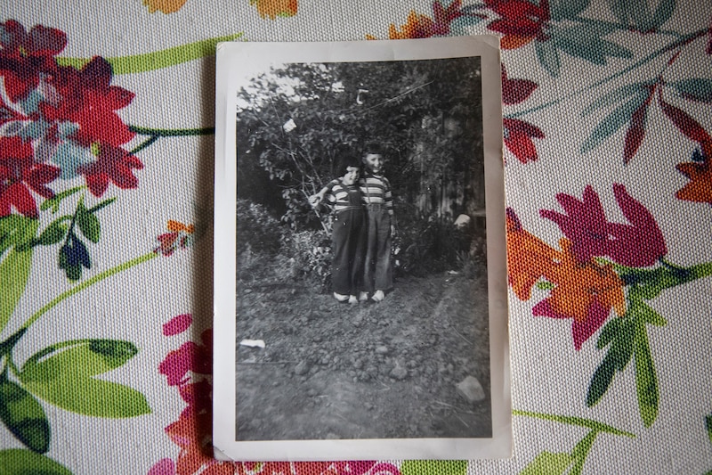 A black-and-white photo of two young girls