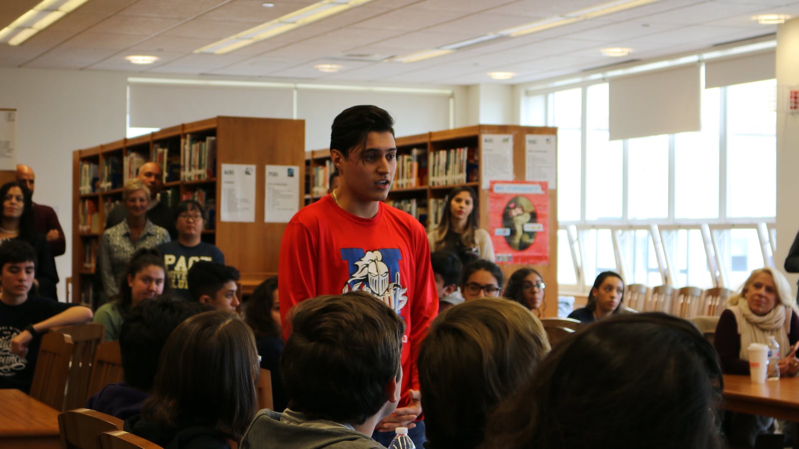 Kevin Flores, a then-senior at Queens Metropolitan High School, talks in 2018 about help college counselors provided for his parents, who are immigrants, to help navigate the college admissions process.