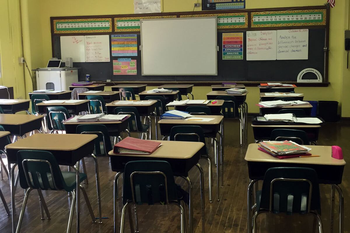 Empty classroom of desks.