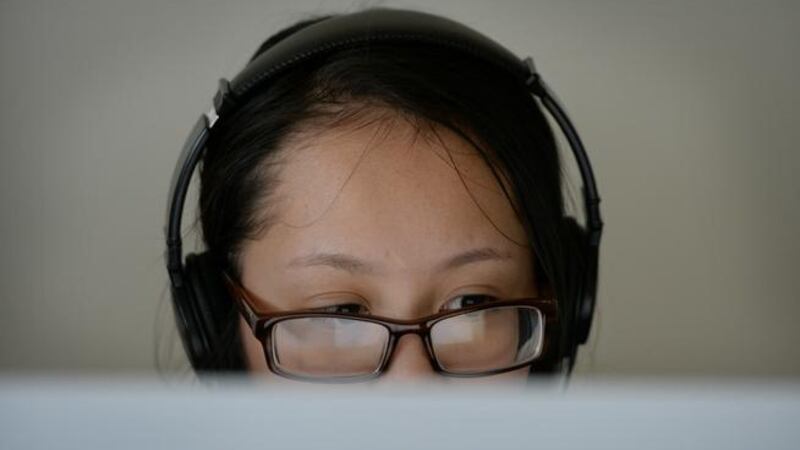 Monica Dinh, a sixth grader in the Sheridan school district, takes part in a practice test in 2015. (Photo by Craig F. Walker / The Denver Post)