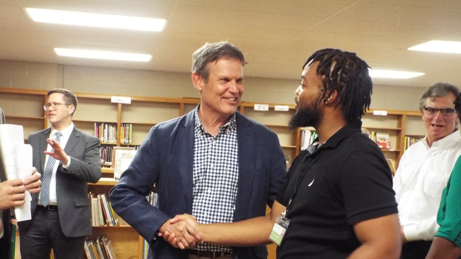 Republican gubernatorial candidate shakes hands with a teacher at the Memphis charter Libertas School.