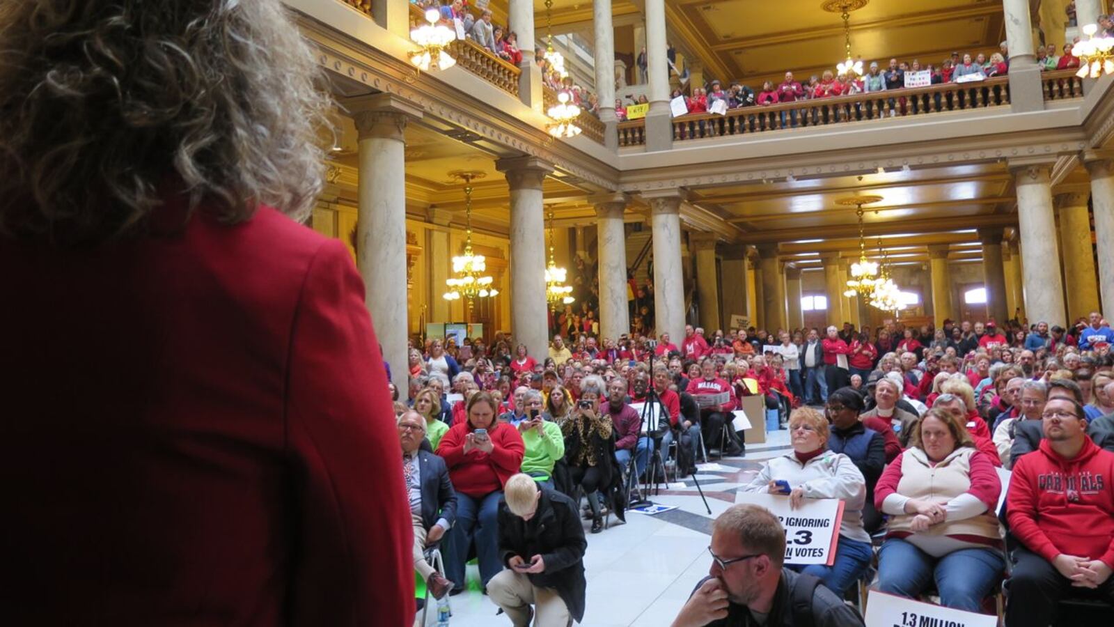 State Superintendent Glenda Ritz waits her turn to speak at a Statehouse rally.