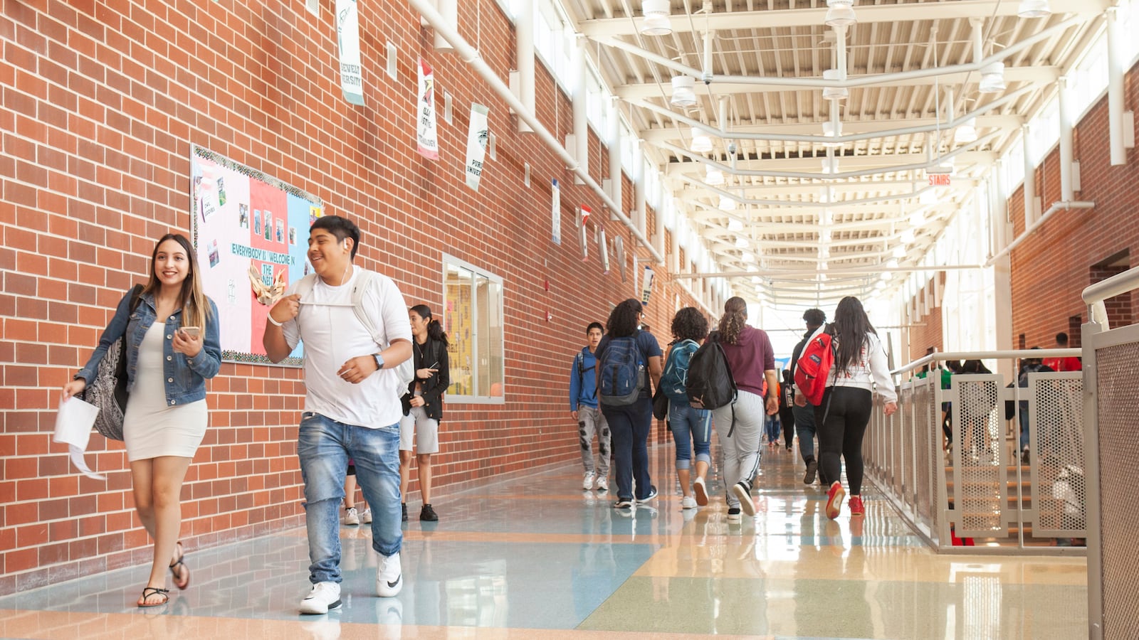 Students walk in the brick-lined hallways at North-Grand High School in Chicago in May 2019.