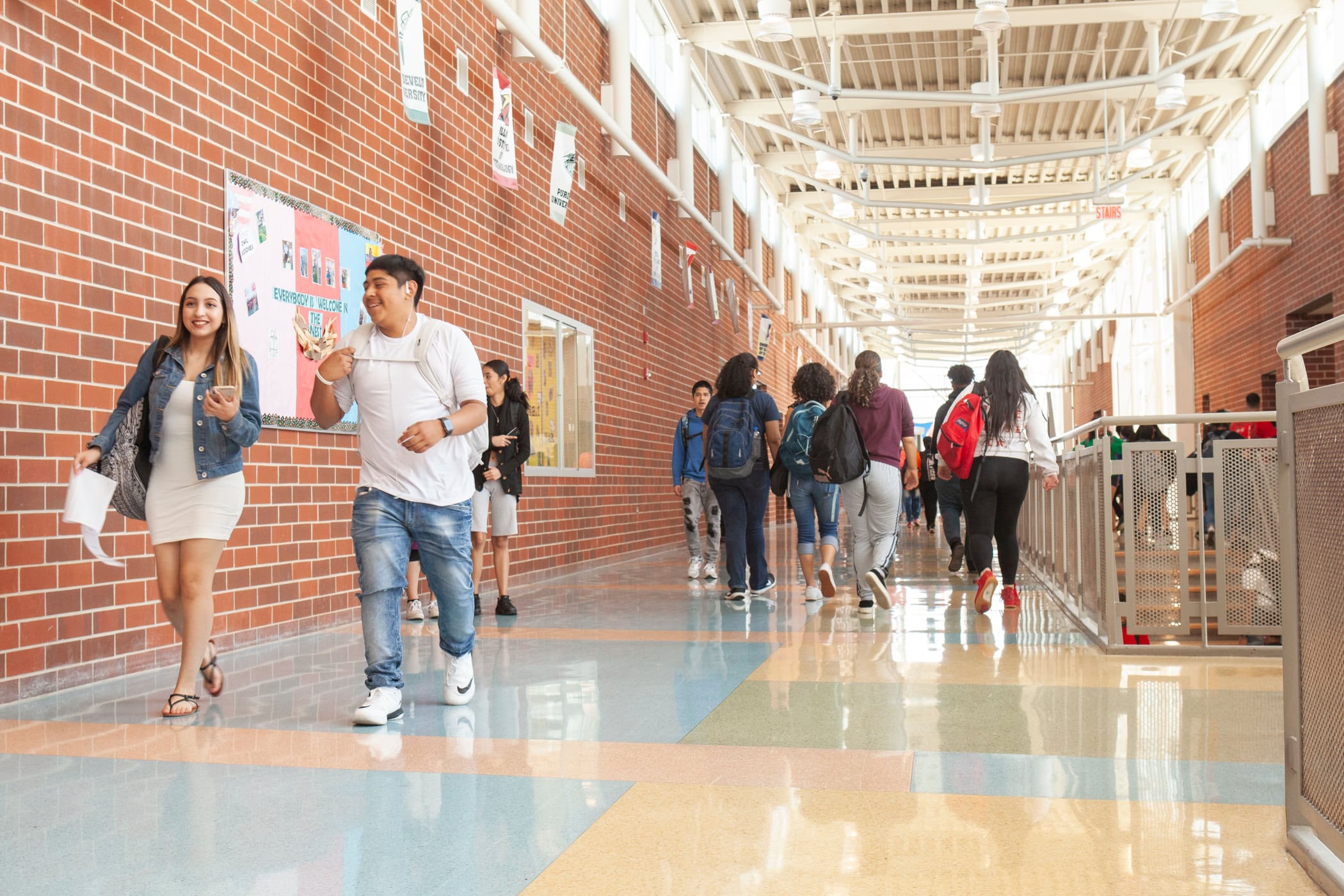 Students walk in the brick-lined hallways at North-Grand High School in Chicago in May 2019.