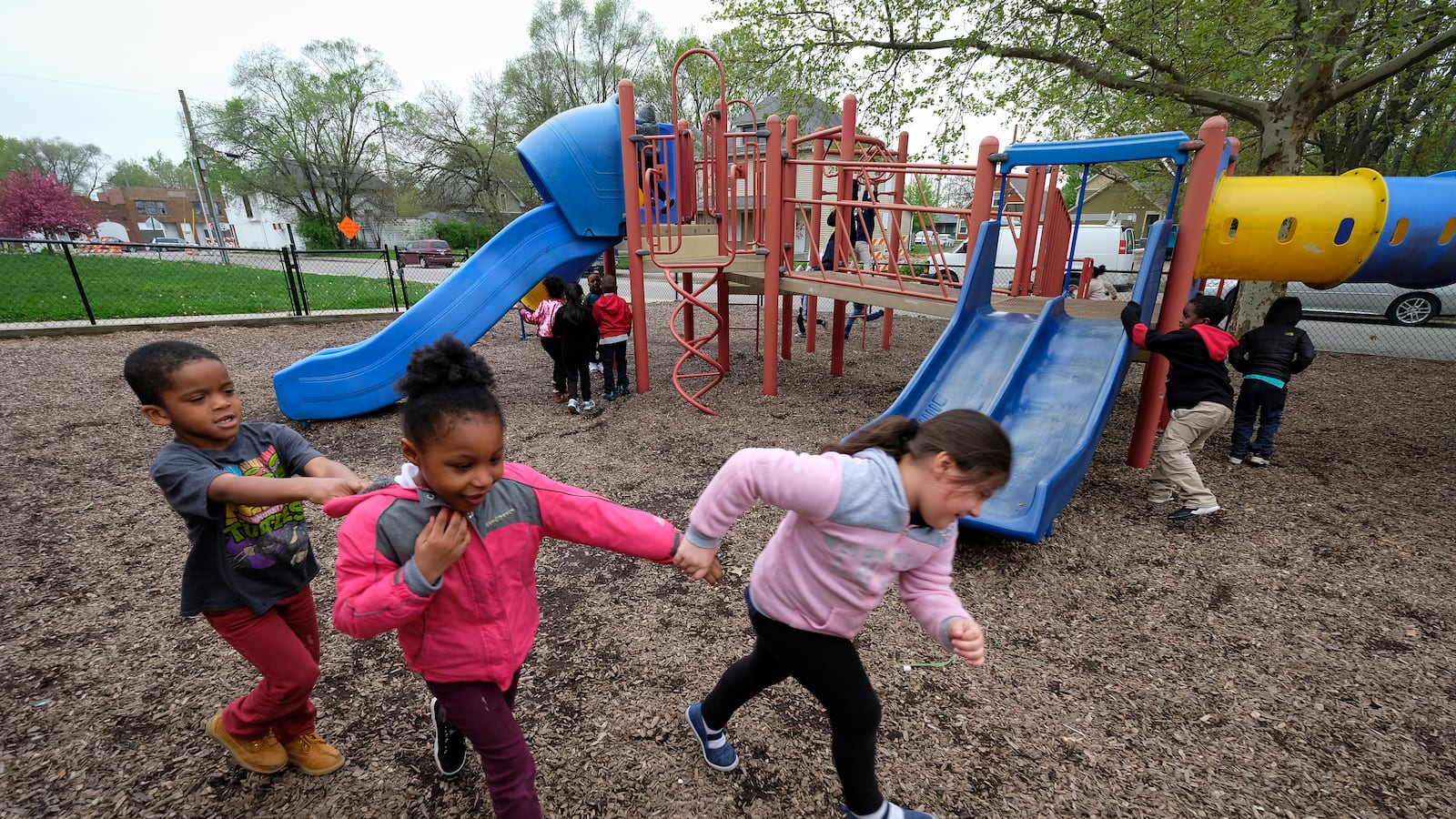 Students play on the playground at Thomas Gregg Neighborhood School.