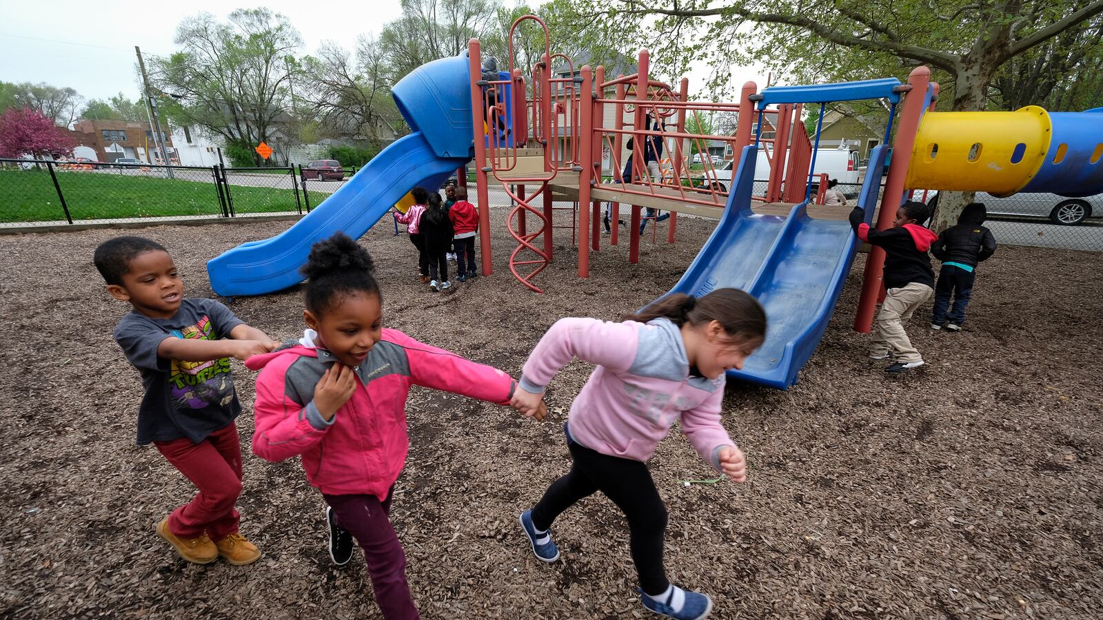 Students play on the playground at Thomas Gregg Neighborhood School.