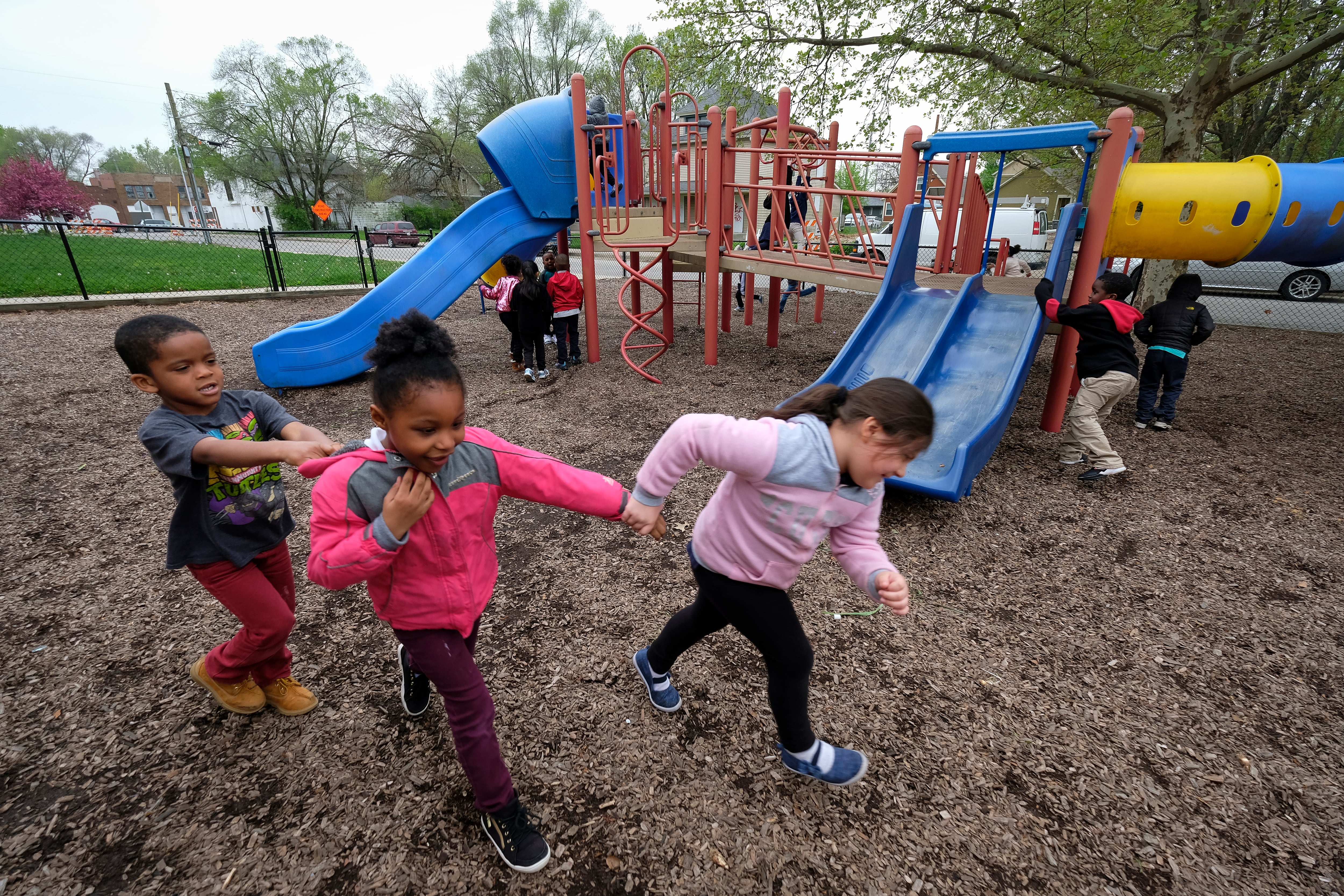 Students play on the playground at Thomas Gregg Neighborhood School.