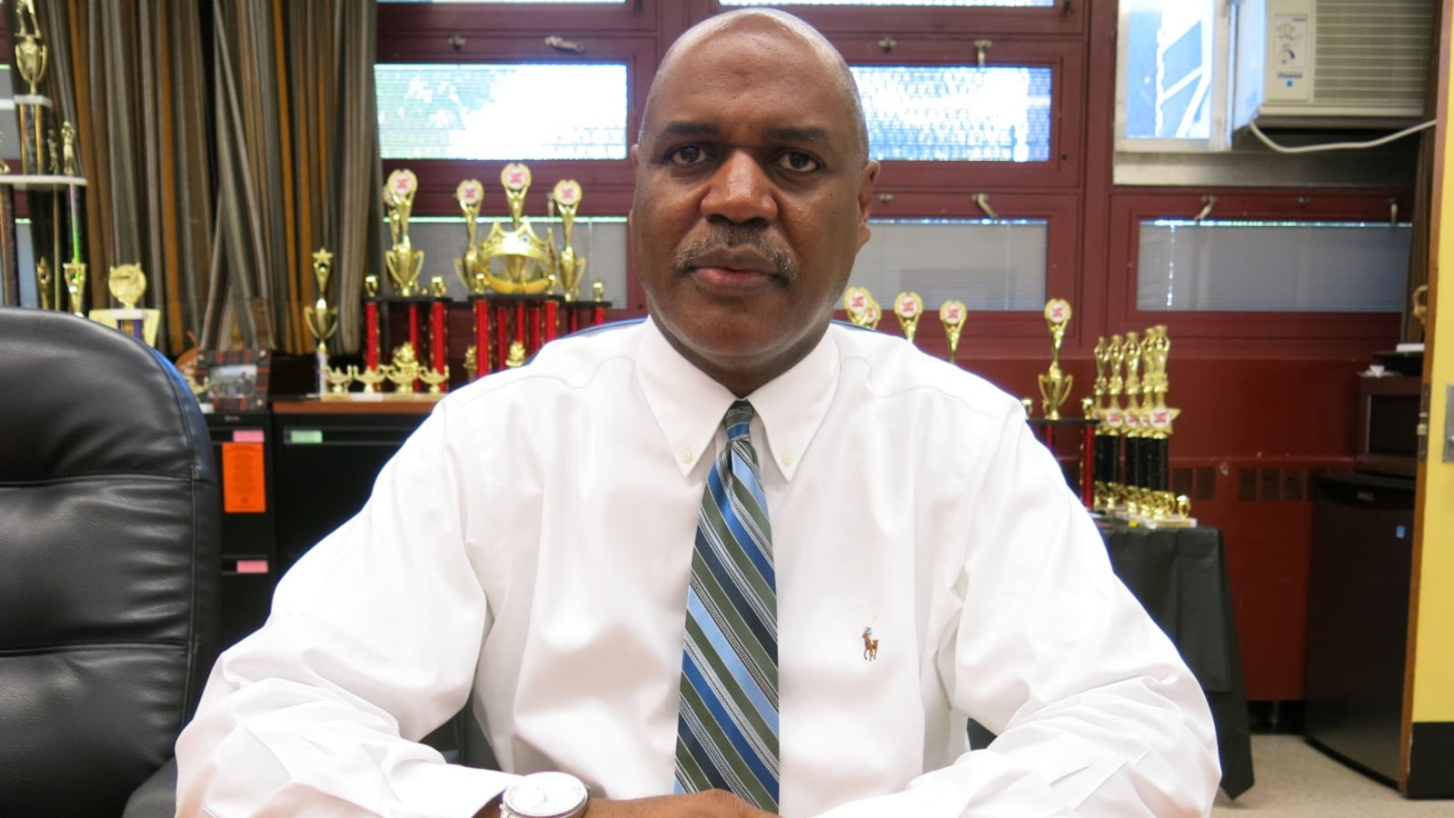 Bernard Gassaway, the principal of Boys and Girls High School, said he is resigning because he does not think the city's plan to improve the school will work.
