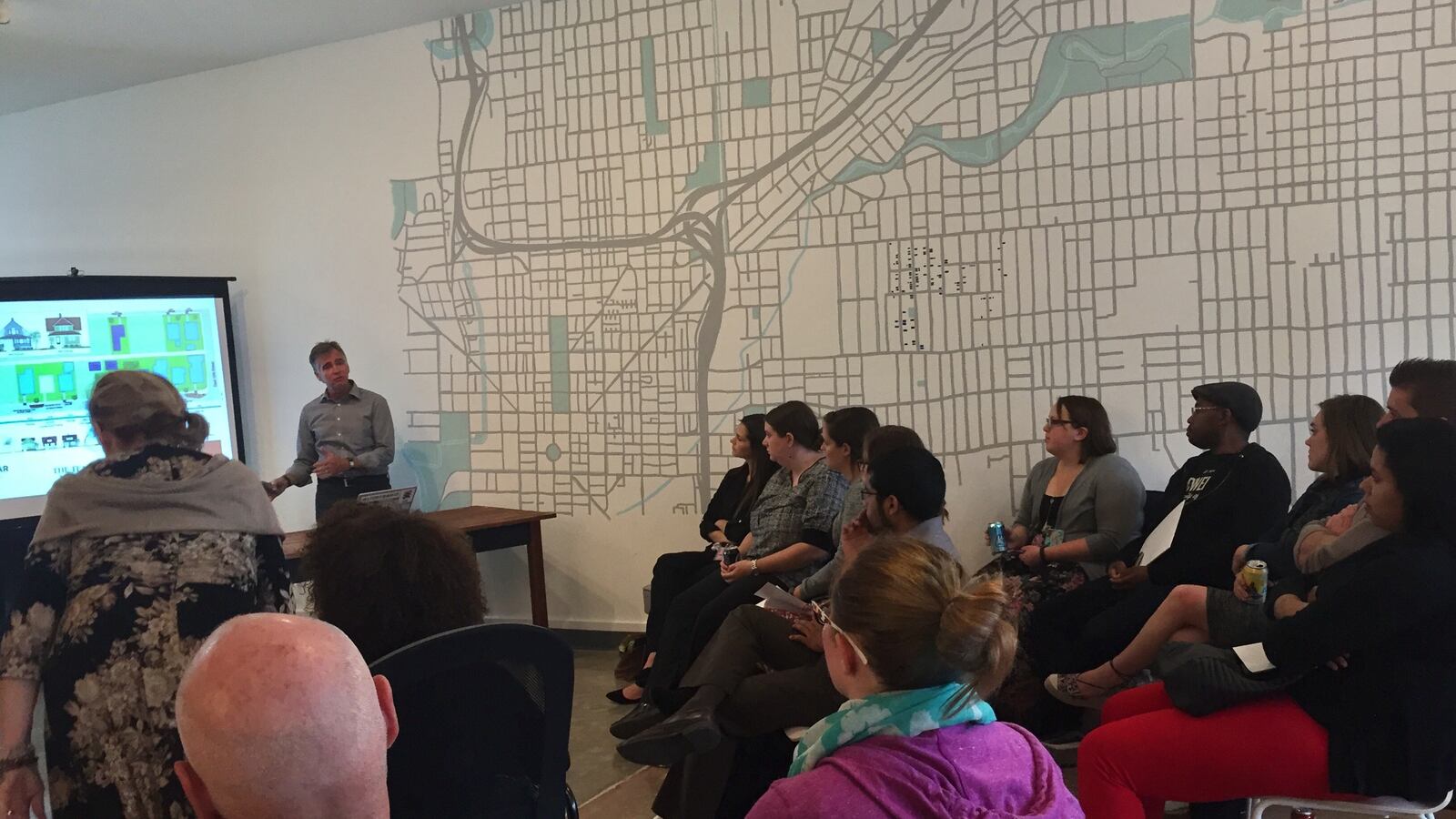 Teachers and community members gather to hear about plans for a new "teacher village" in development on the city's near-east side.