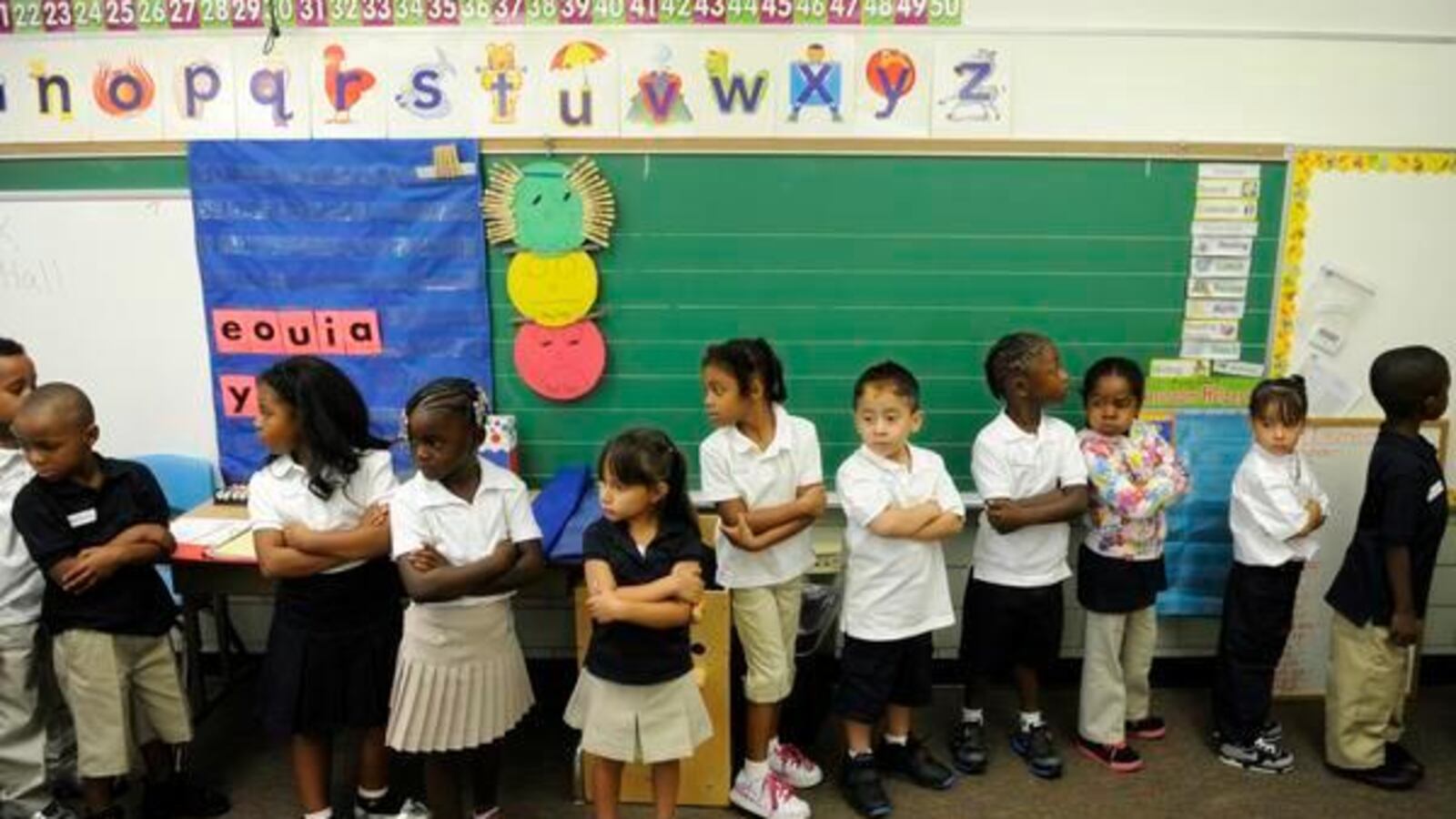 Kindergarten students line up on the first day of school in 2012 at Whittier K-8 School in Denver. (Photo by RJ Sangosti, The Denver Post)