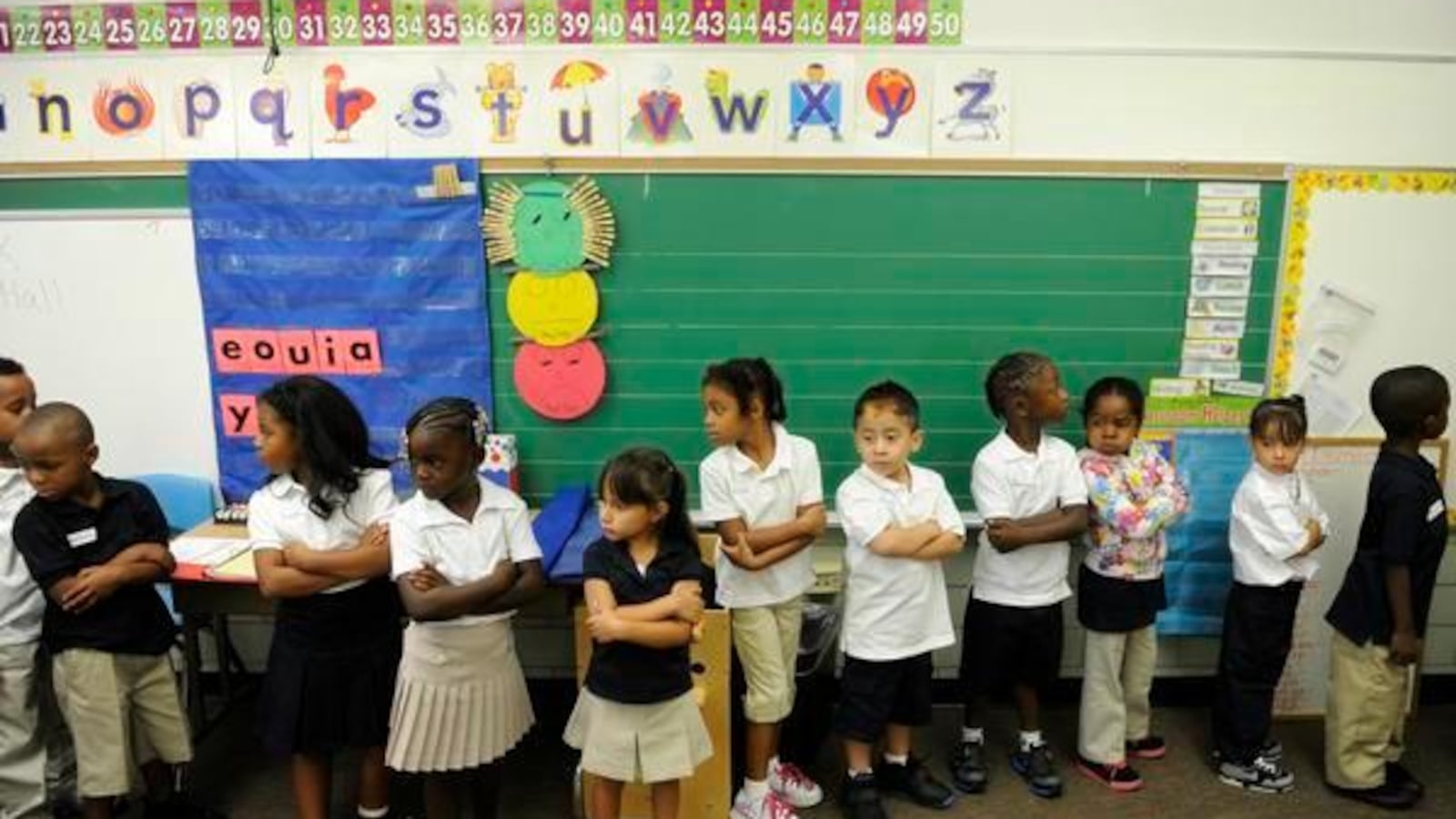 Kindergarten students line up on the first day of school in 2012 at Whittier K-8 School in Denver. (Photo by RJ Sangosti, The Denver Post)