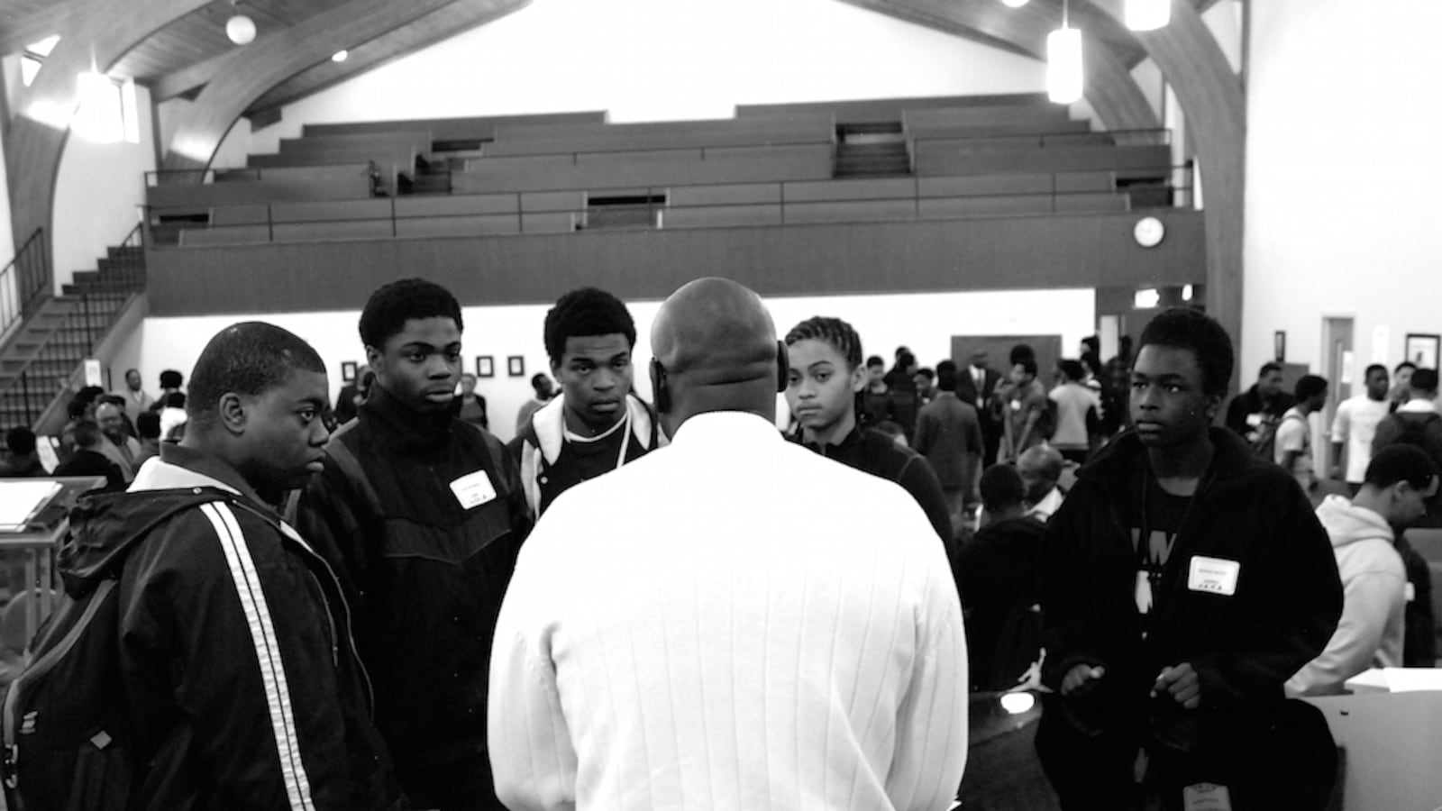 African-American male students from Hinkley High School met with business professionals and discussed race issues Friday at what is expected to be an annual summit for black males.