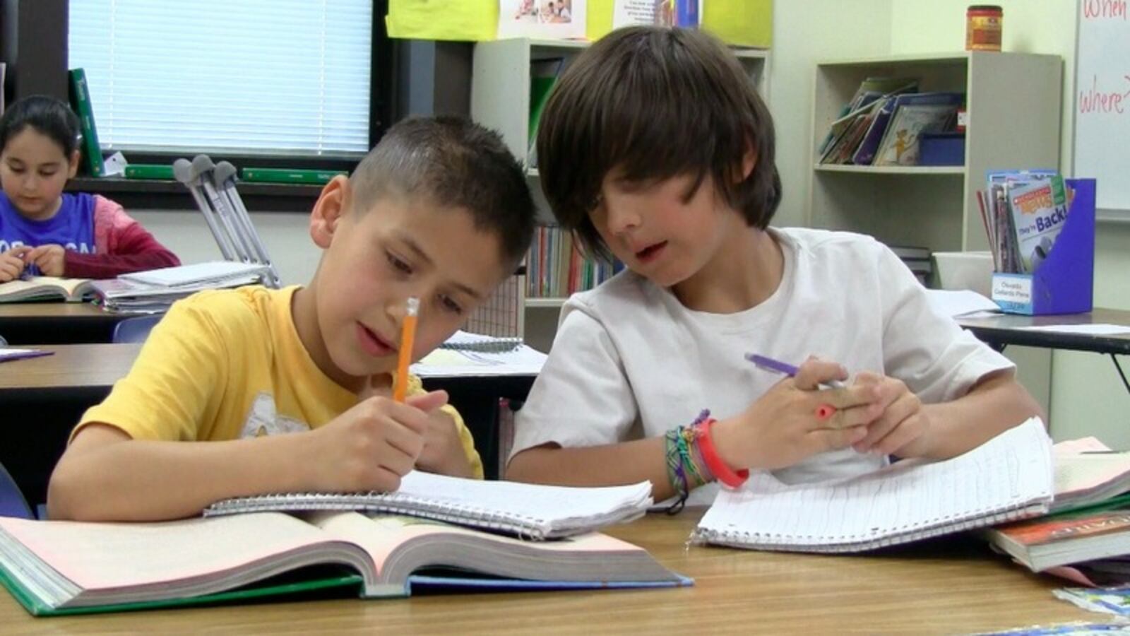 Students at Sheridan’s Fort Logan Elementary collaborate on a literacy lesson.