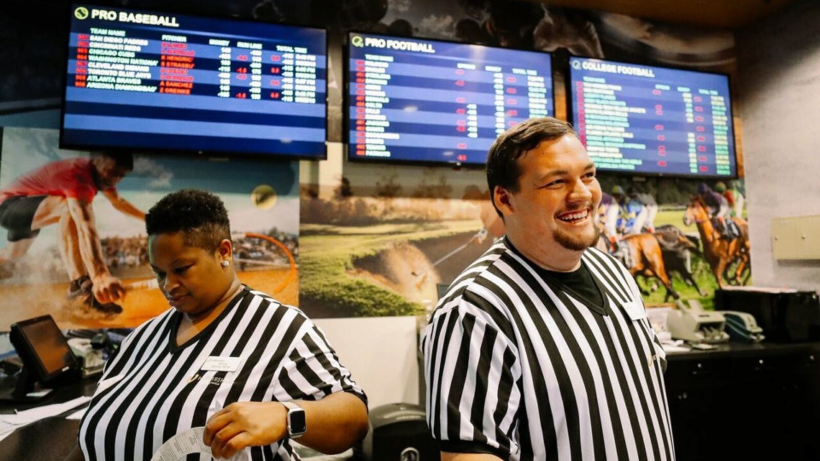 Erica Shirley (left) and Graham Lowing became employees at Horseshoe Casino to work in its sports betting lounge after Mississippi joined Nevada, Delaware, New Jersey and West Virginia in making sports betting legal in the state. On Dec. 14, Tennessee Attorney General Herbert Slatery issued an opinion stating the Tennessee General Assembly may legalize sports betting without a constitutional amendment as long as the sport is based on skill and not predominantly on “chance.” (Houston Cofield/Dail