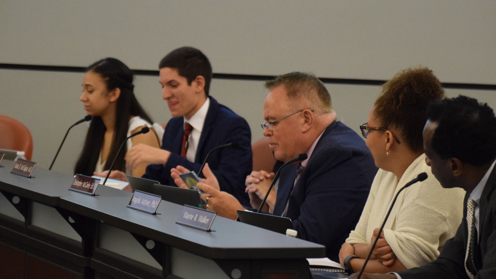 School board member Chris McGinley speaks during a school board meeting May 30
